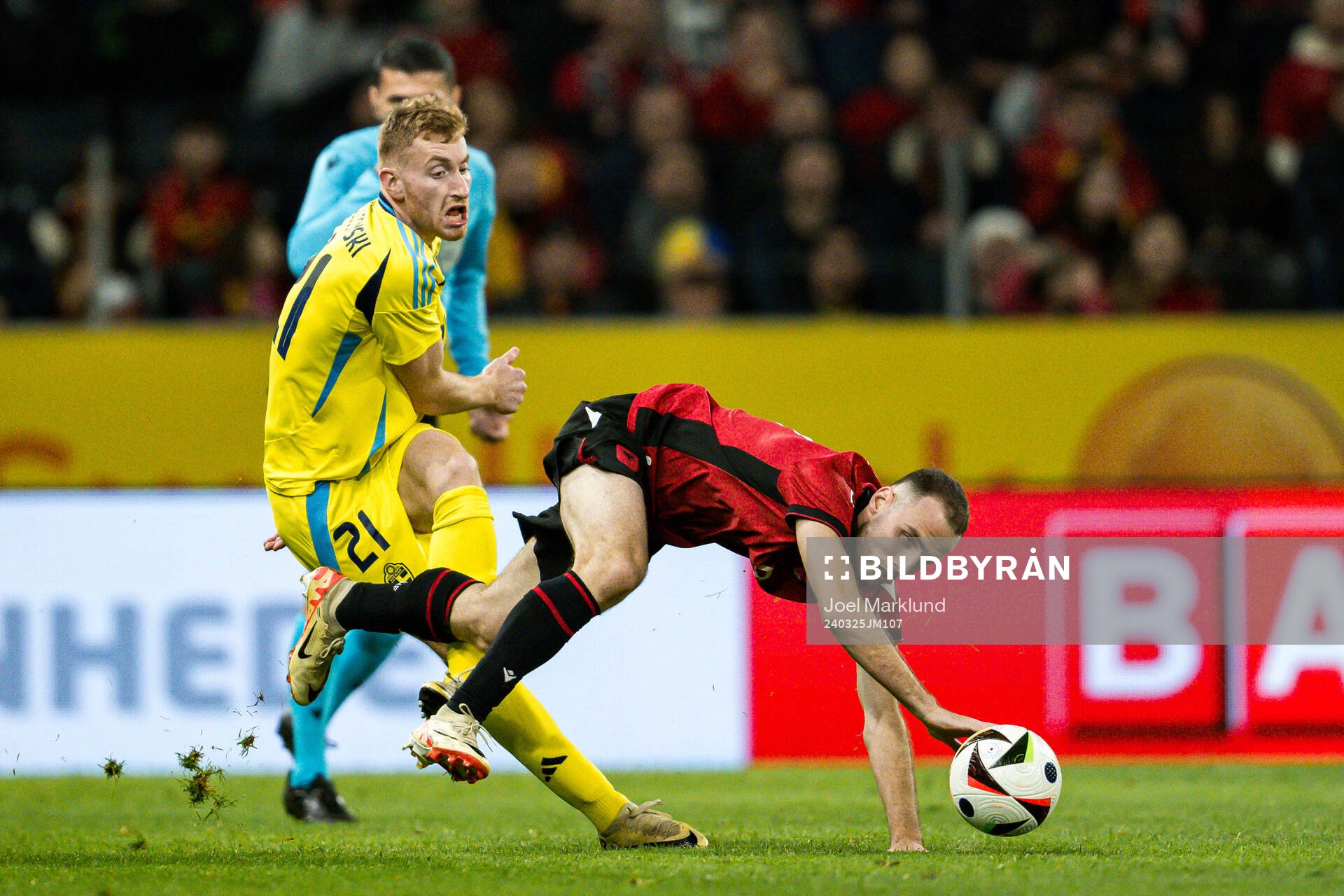 Dejan Kulusevski of Sweden and Mario Mitaj of Albania