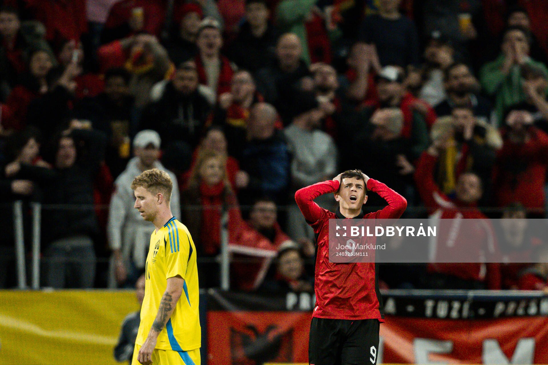 Jasir Asani of Albania looks dejected