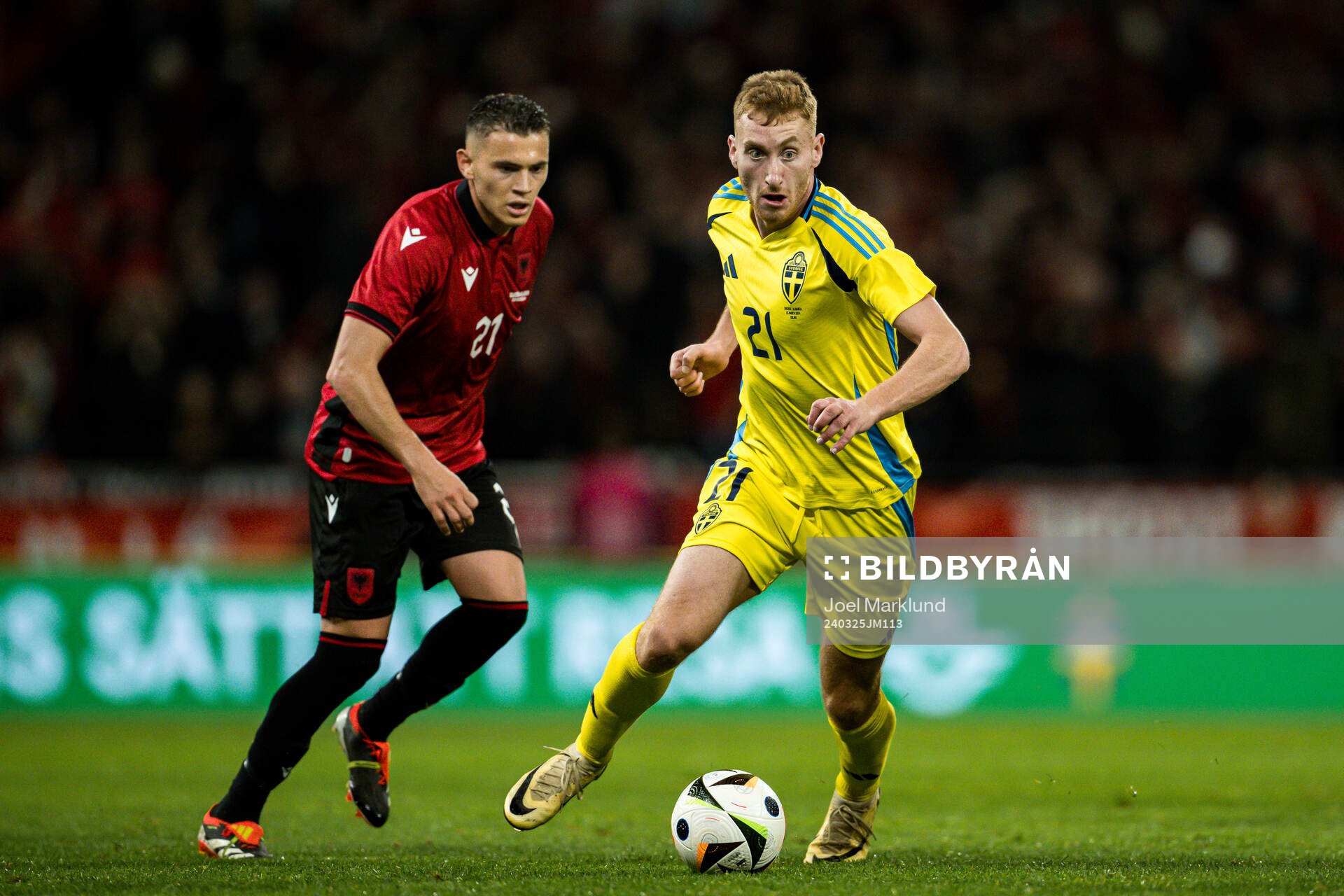 Kristjan Asllani of Albania and Dejan Kulusevski of Sweden