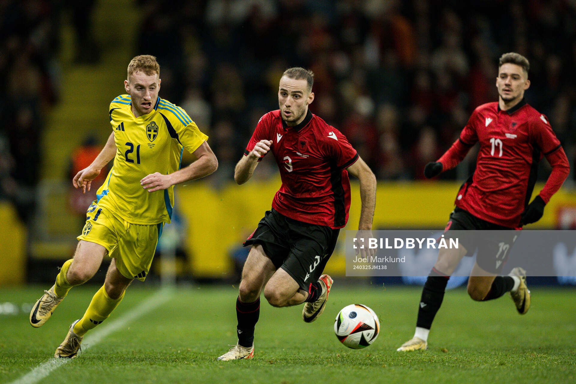 Dejan Kulusevski of Sweden and Mario Mitaj of Albania