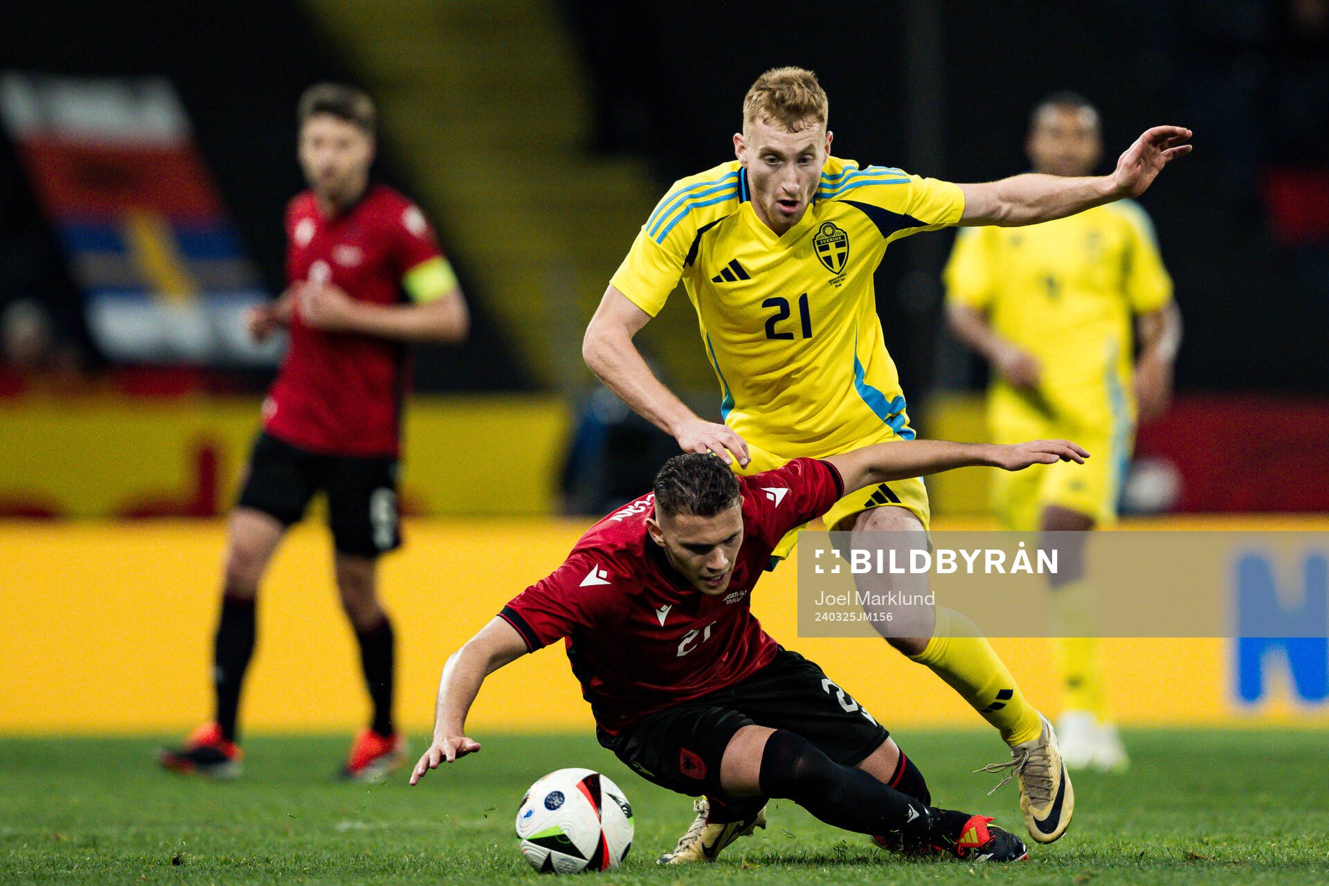 Kristjan Asllani of Albania and Dejan Kulusevski of Sweden