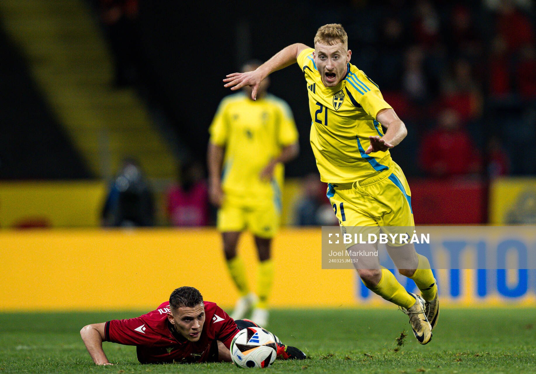 Kristjan Asllani of Albania and Dejan Kulusevski of Sweden
