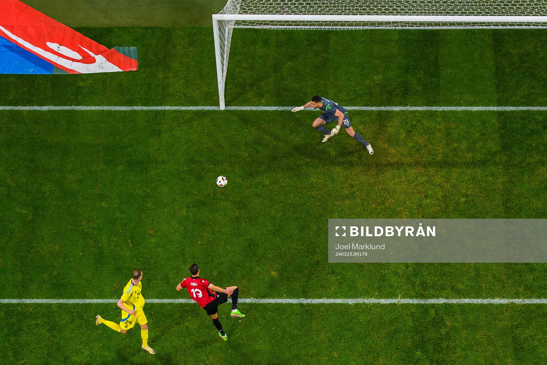 Gustaf Nilsson of Sweden scores 1-0 behind goalkeeper