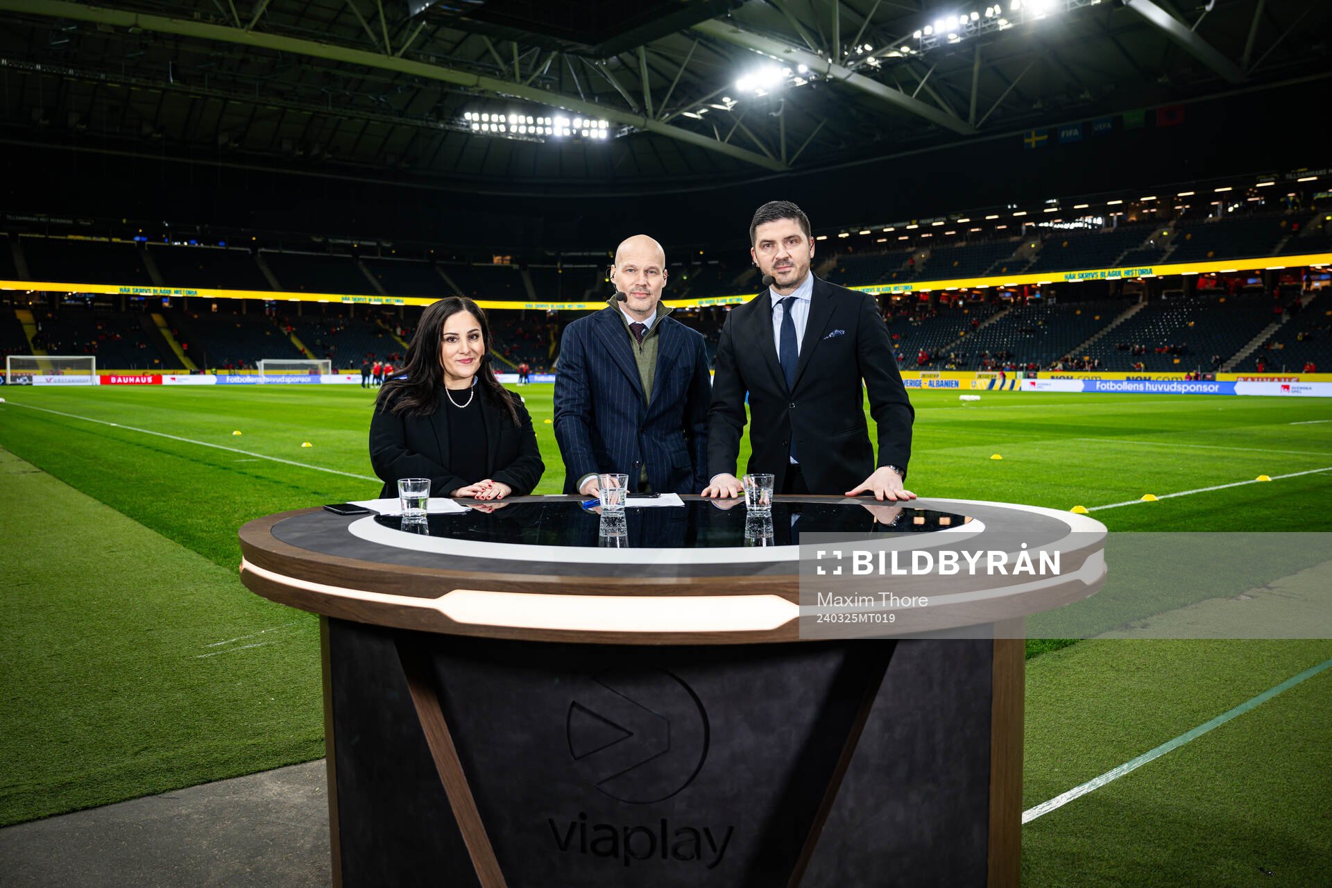 Jennifer Kücükaslan, Fredrik Ljungberg and Bojan Djordjic of Swedish broadcaster Viaplay pose for a picture ahead of the international friendly football match between Sweden and Albania on March 25, 2024 in Stockholm.