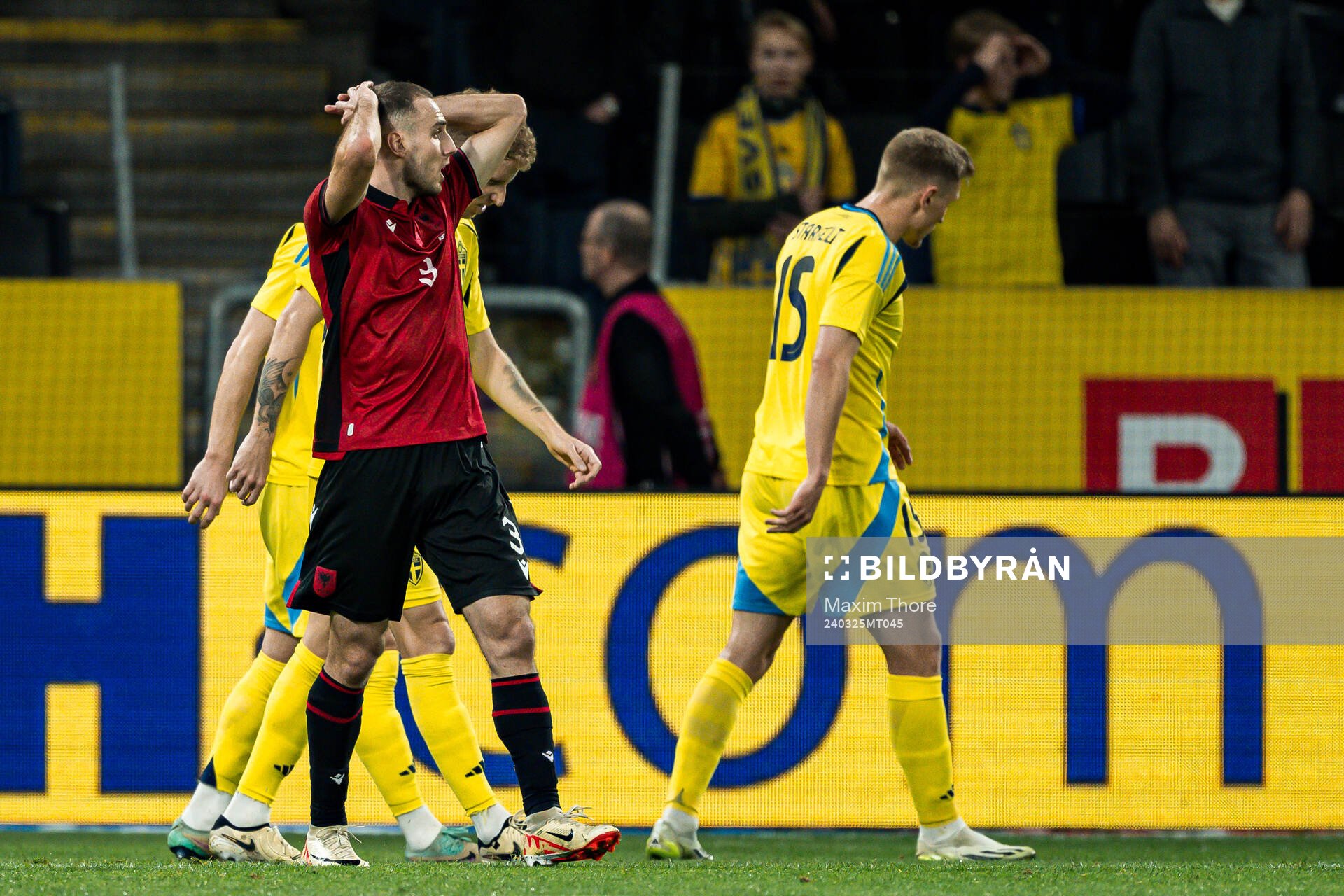 Jasir Asani of Albania looks dejected