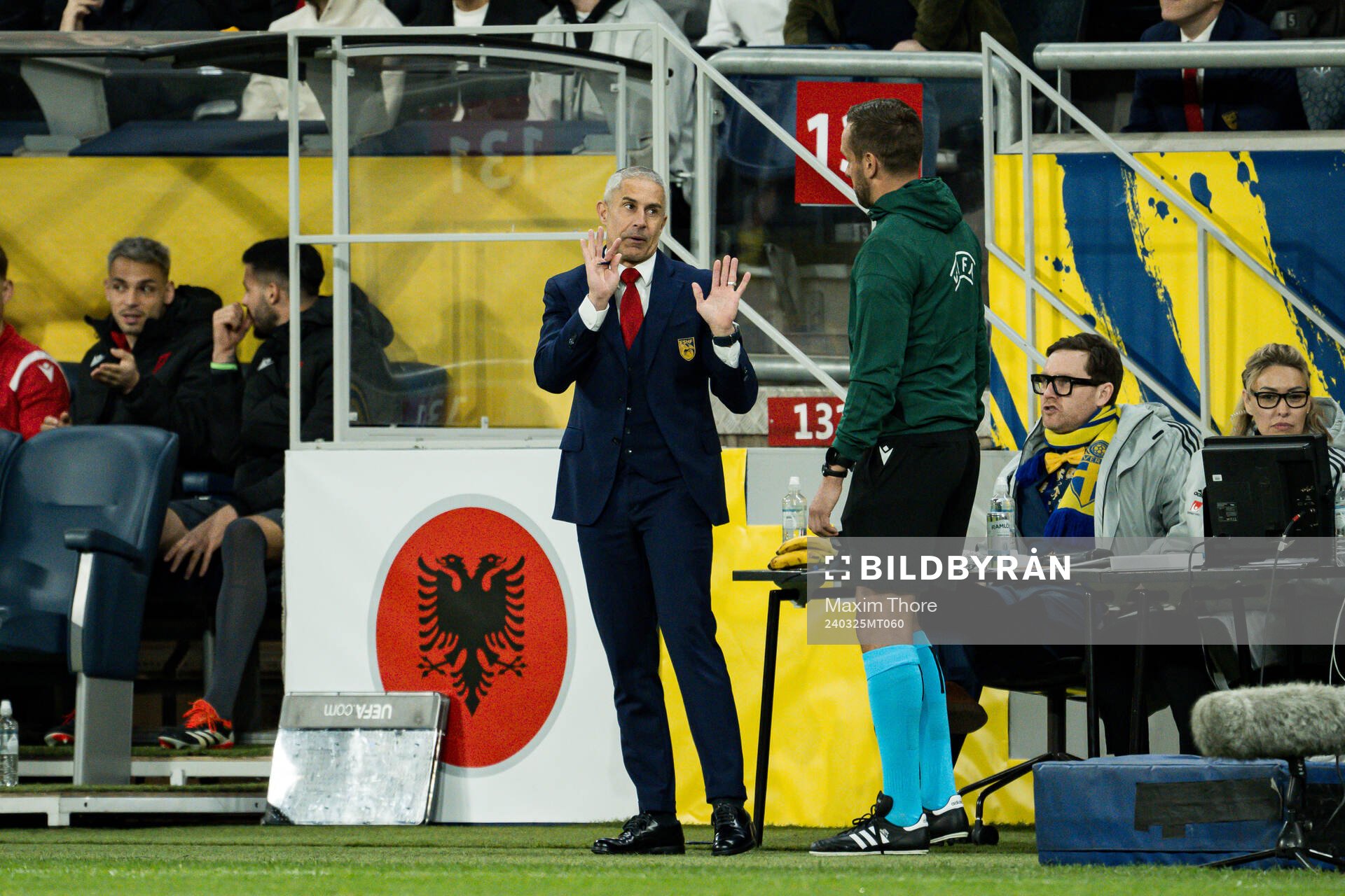 Head coach Sylvinho of Albania and Fourth Official Victor