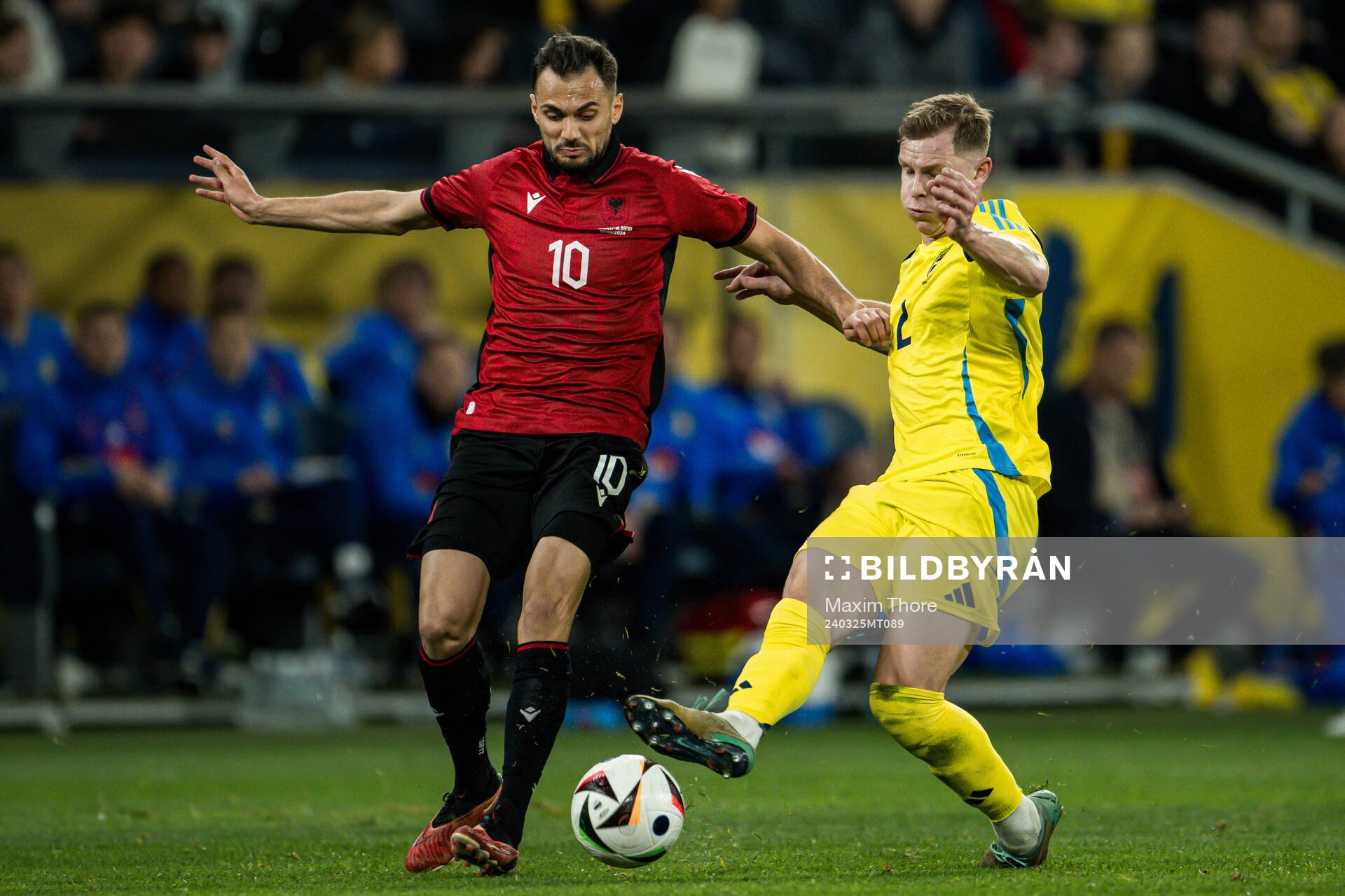 Nedim Bajrami of Albania and Emil Krafth of Sweden