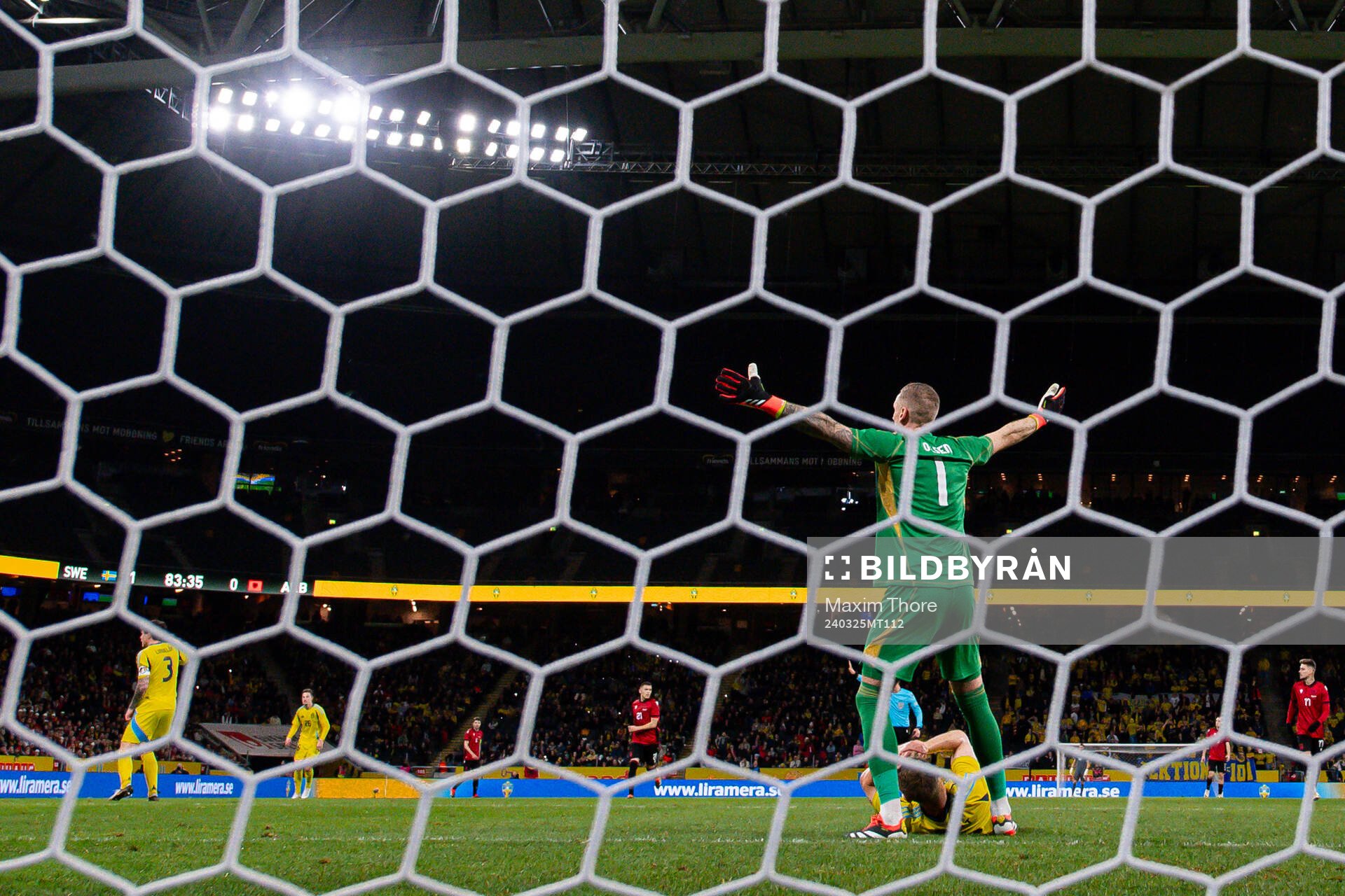 goalkeeper Robin Olsen of Sweden reacts as Carl Starfelt is