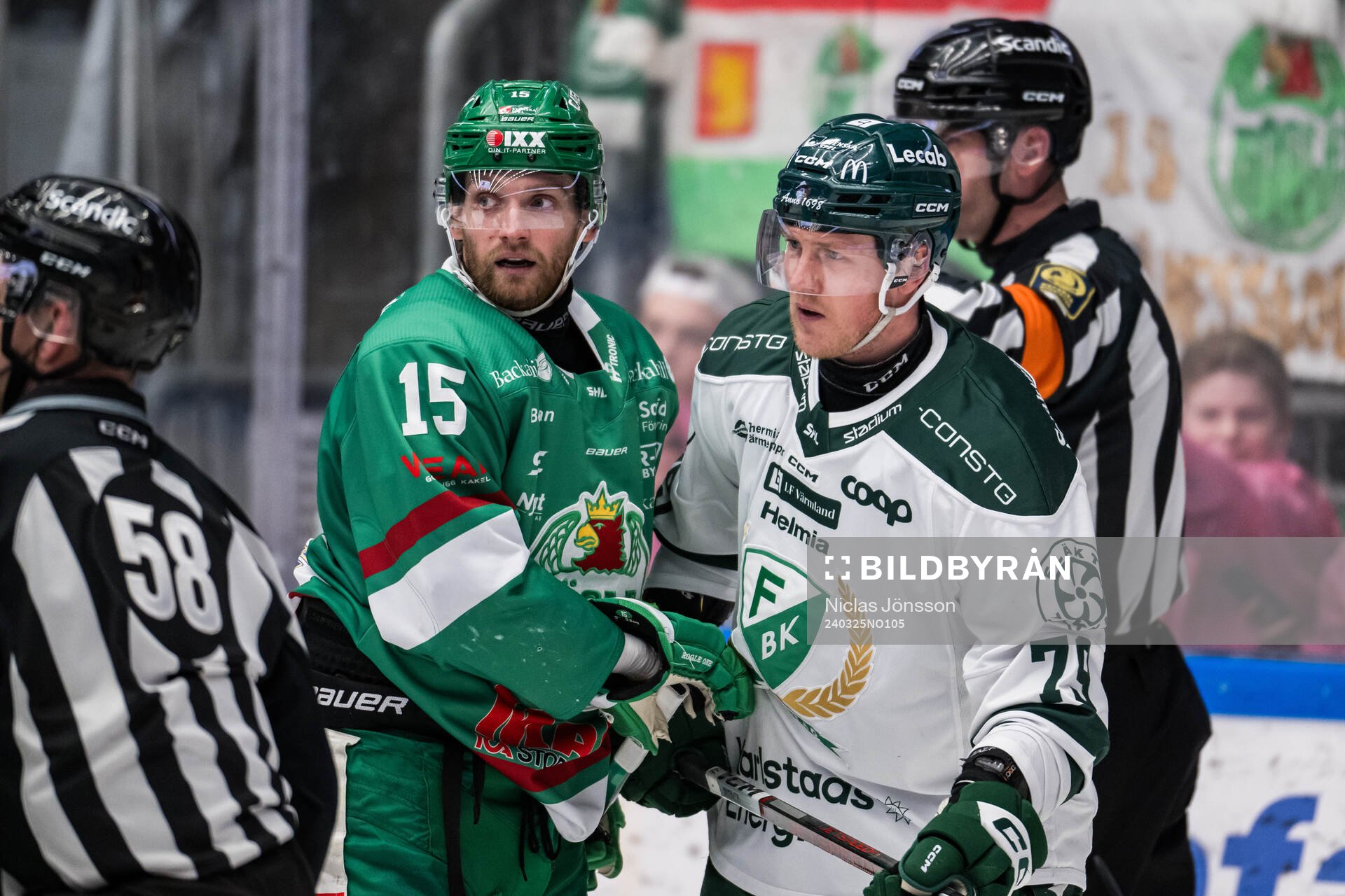 Rögles Simon Ryfors  och Färjestads Patrik Lundh