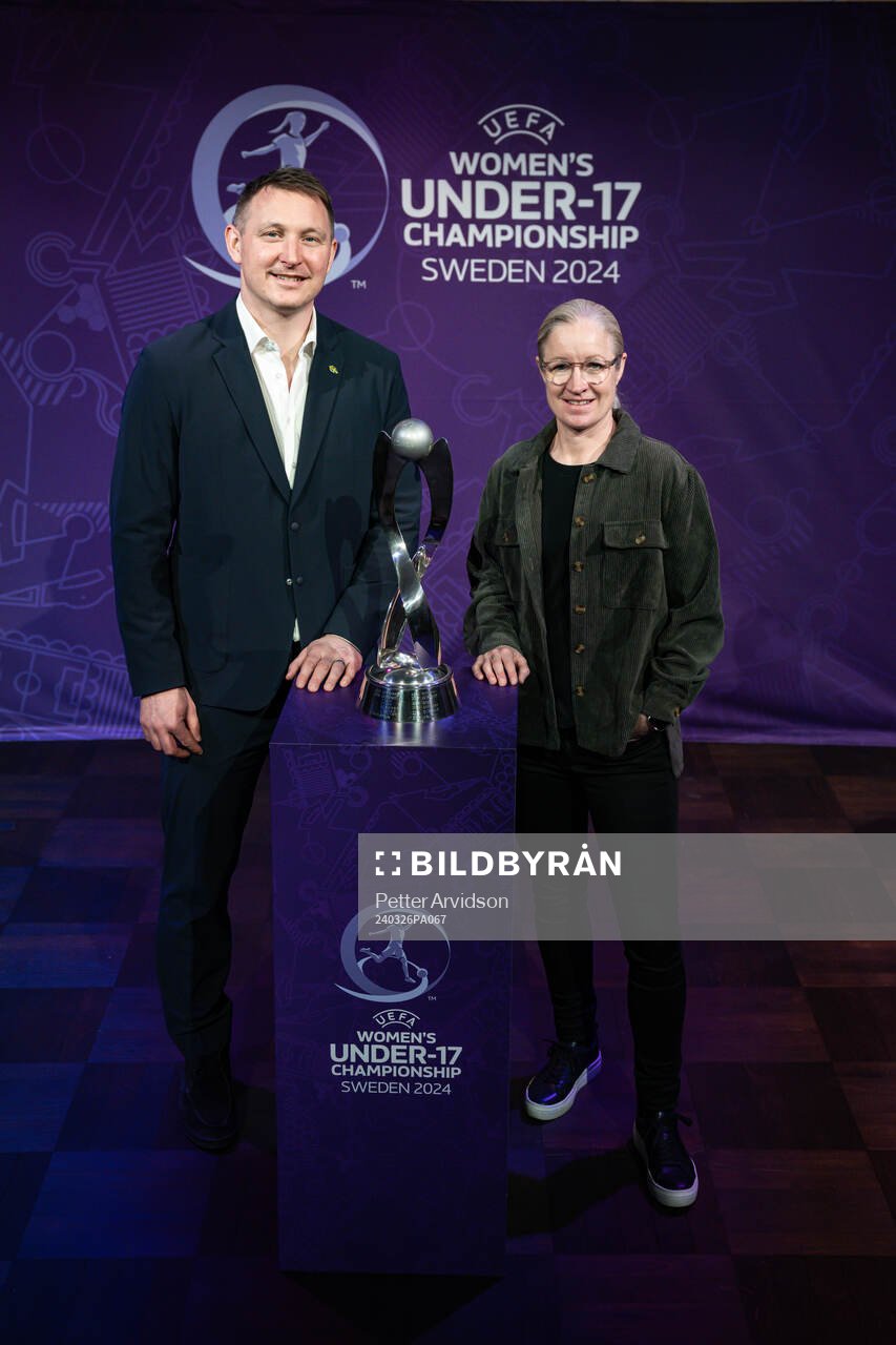 Kim Källström, Head of Football at the Swedish Football Association, and Victoria Sandell, Tournament Ambassador, poses with the trophy, during the UEFA European Women’s Under-17 Championship 2023/24 Final Tournament Draw at Lund City Hall on March 26, 2024 in Lund, Sweden.