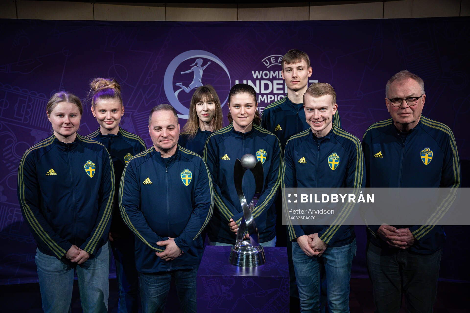 Hosts of team Sweden poses for a picture
