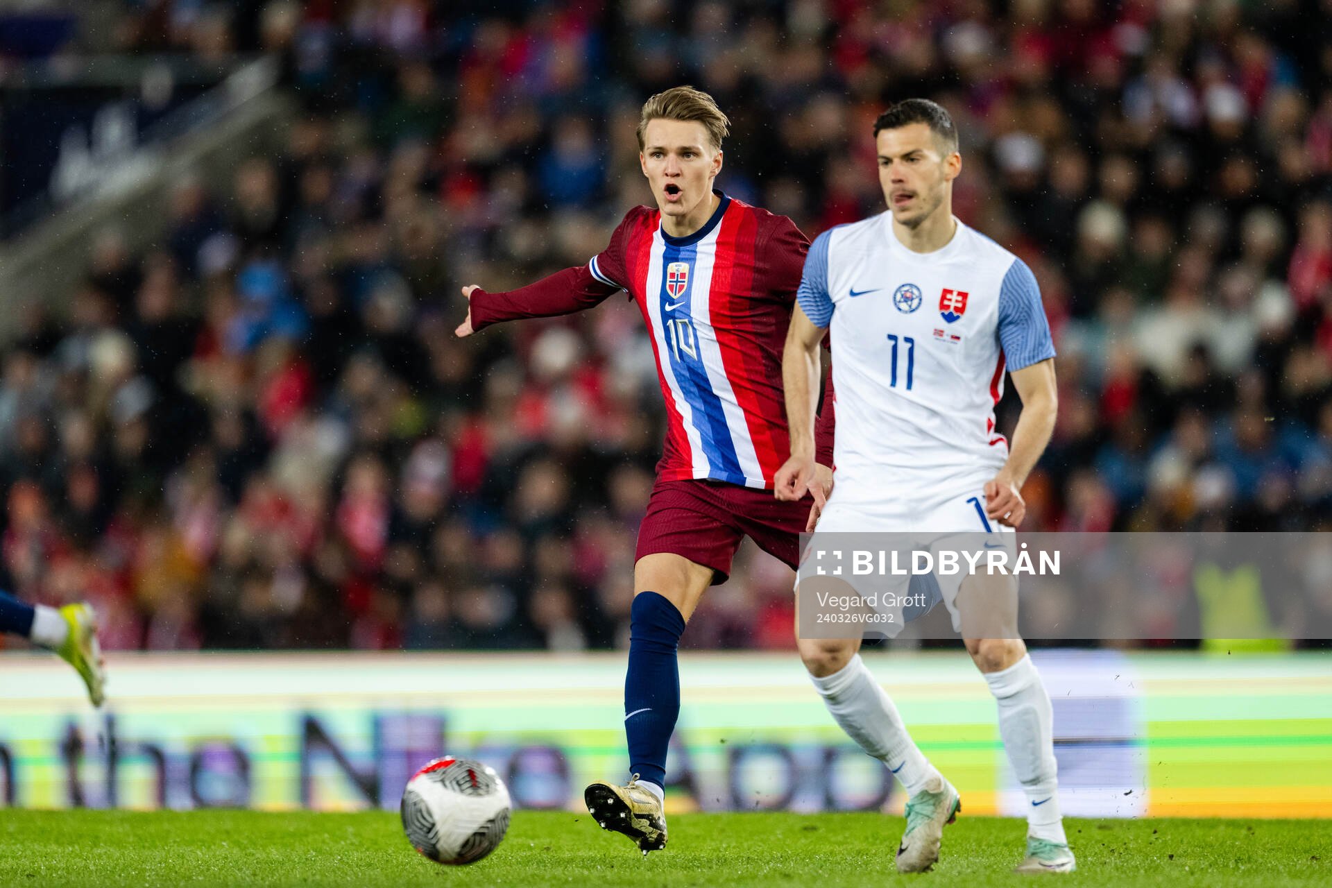 Martin Ødegaard of Norway and Laszlo Benes of Slovakia