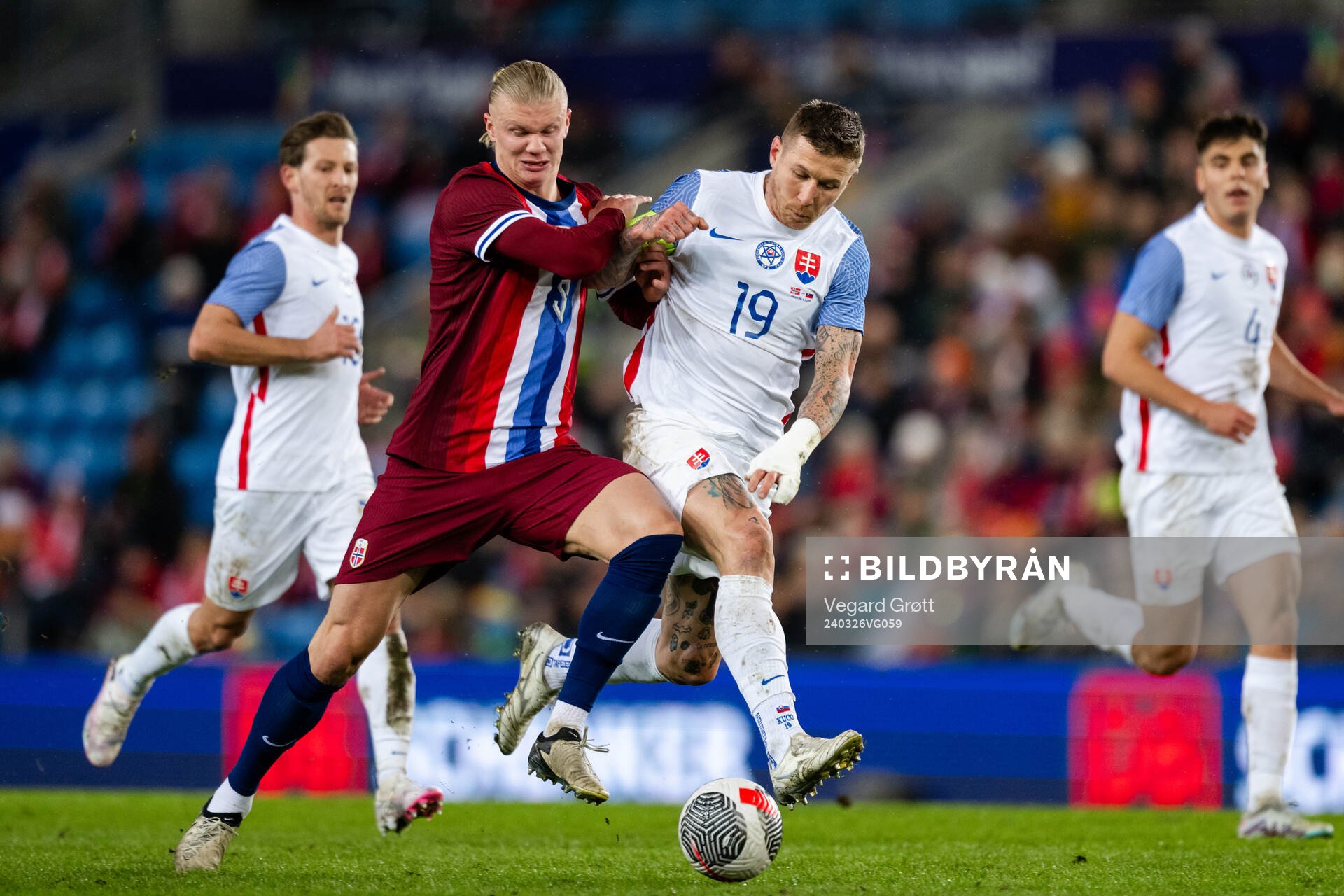 Erling Braut Haaland of Norway and Juraj Kucka of Slovakia