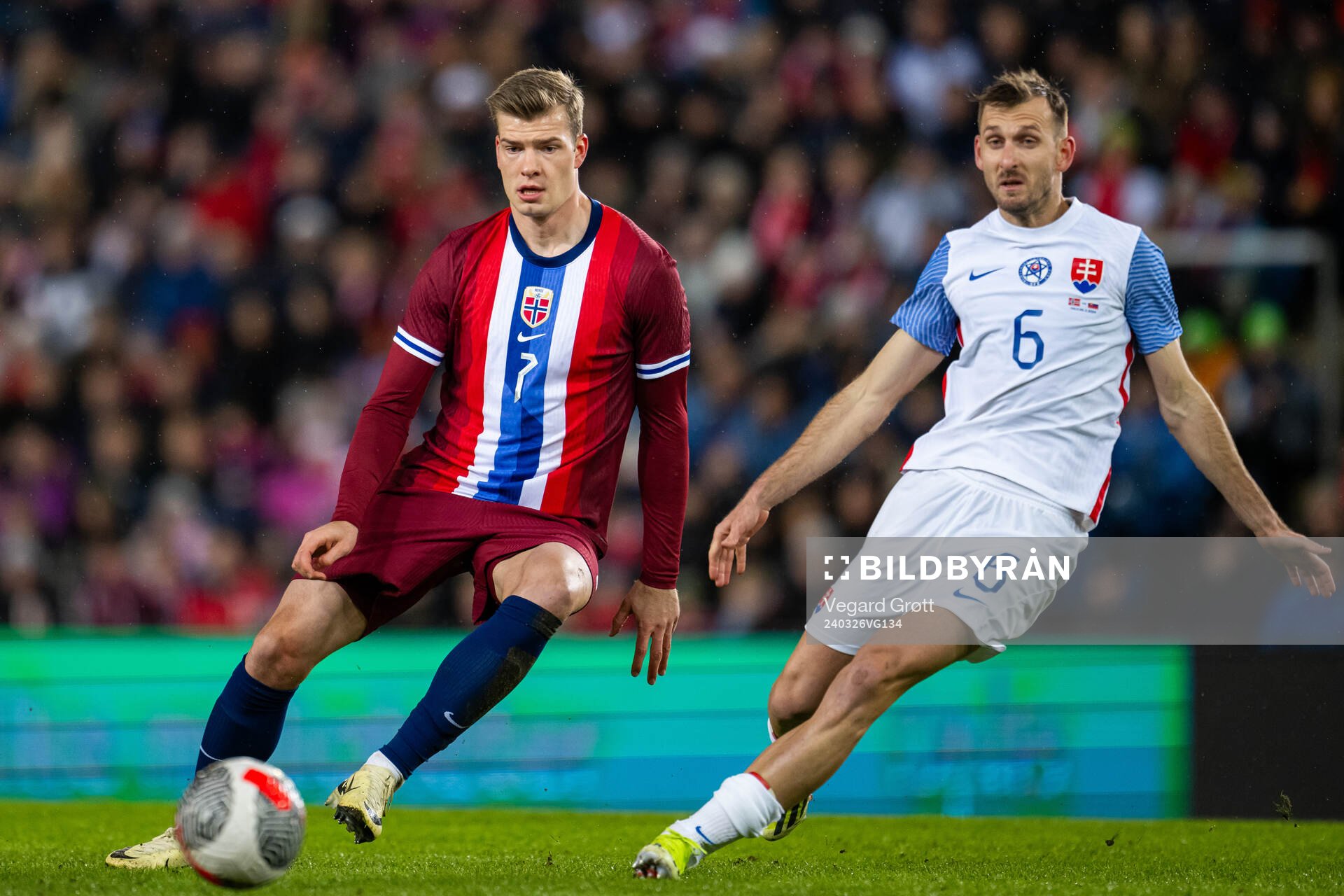 Alexander Sørloth of Norway and Norbert Gyömber of