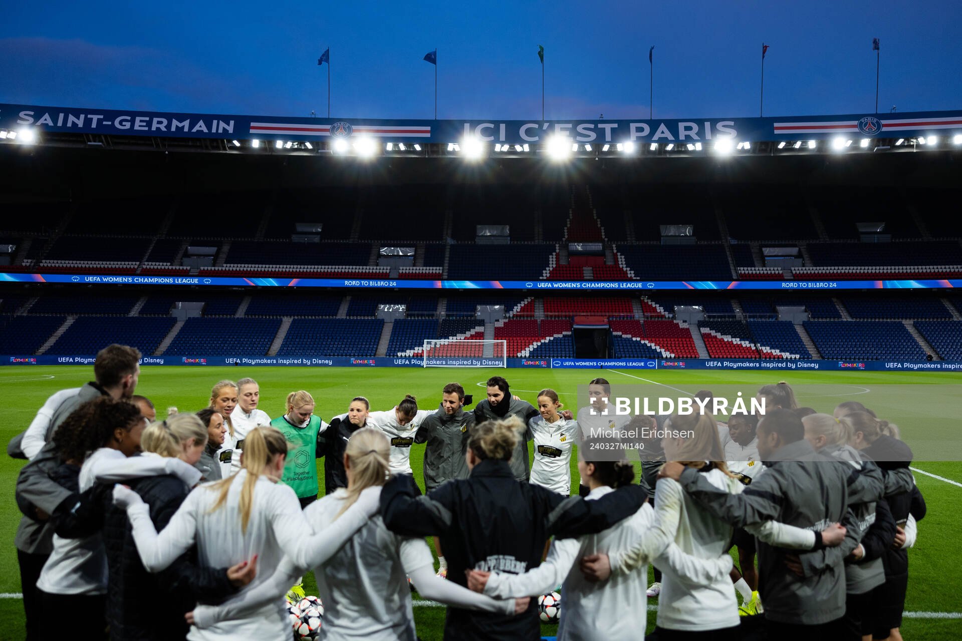 Players and staff gathered