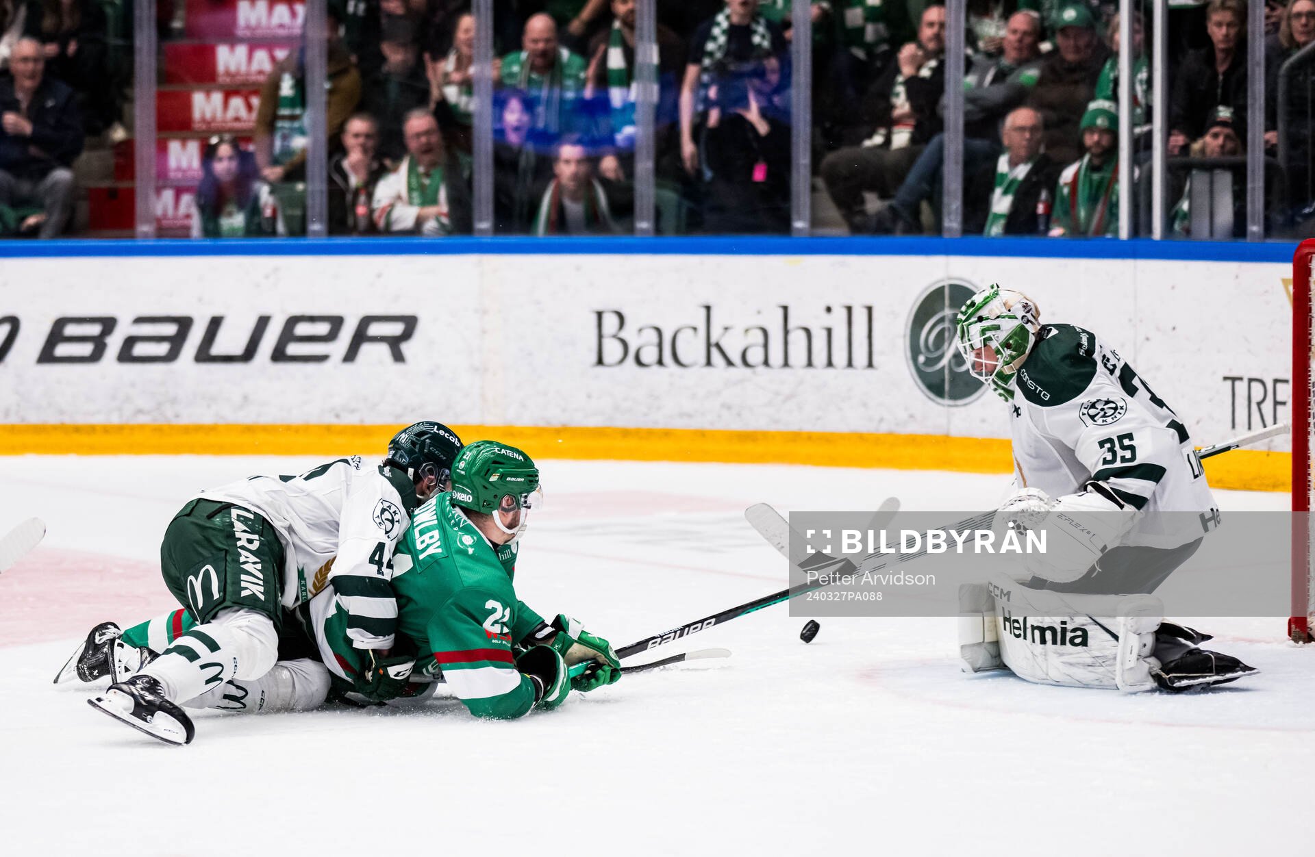 Färjestads Jonathan Andersson och målvakt Carl Lindbom