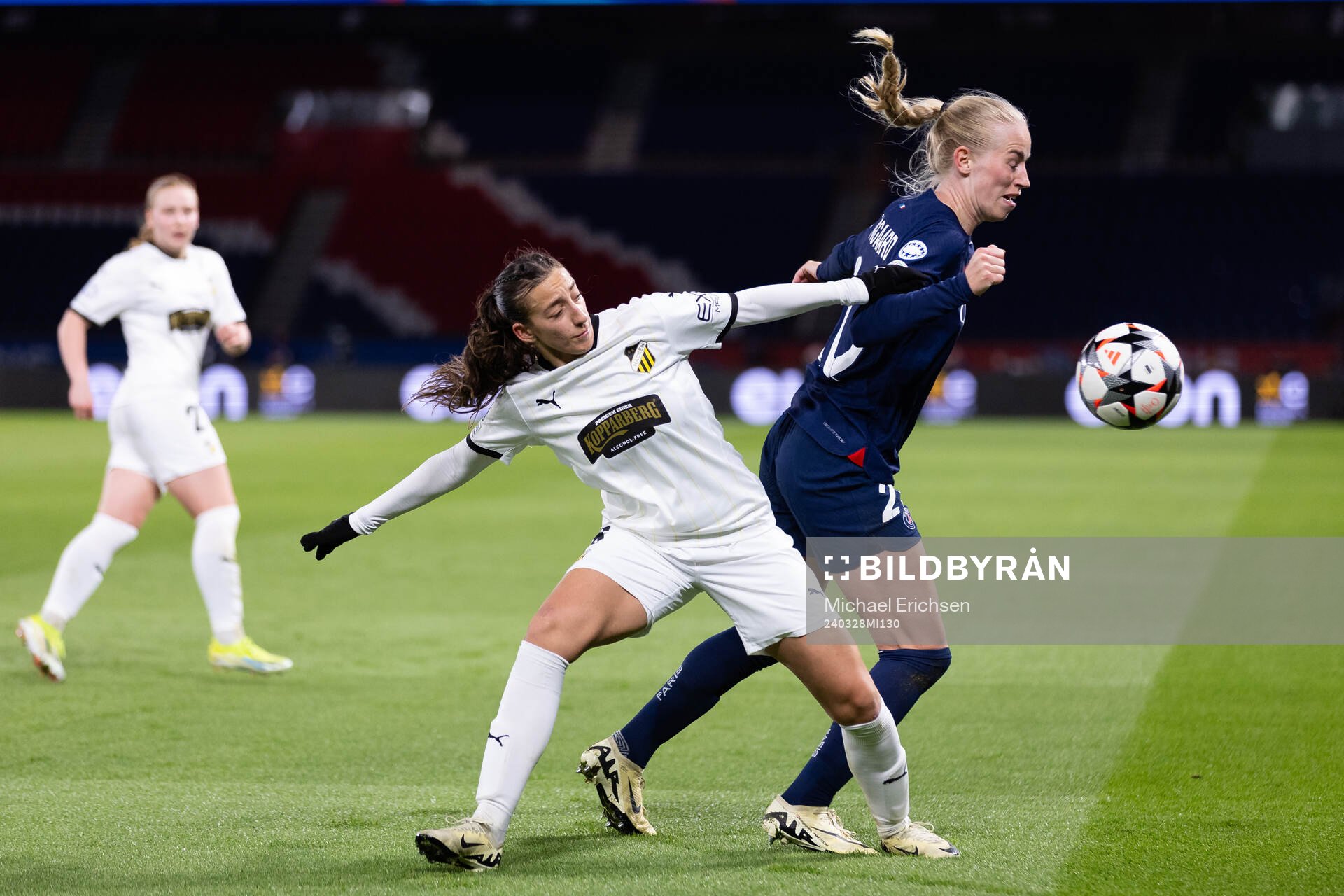Rusul Rosa Kafaji of Häcken and Amalie Vangsgaard of Paris Saint Germain during the UEFA Women's Champions League football match quarterfinal two between Paris Saint Germain and Häcken on March 28, 2024 in Paris.