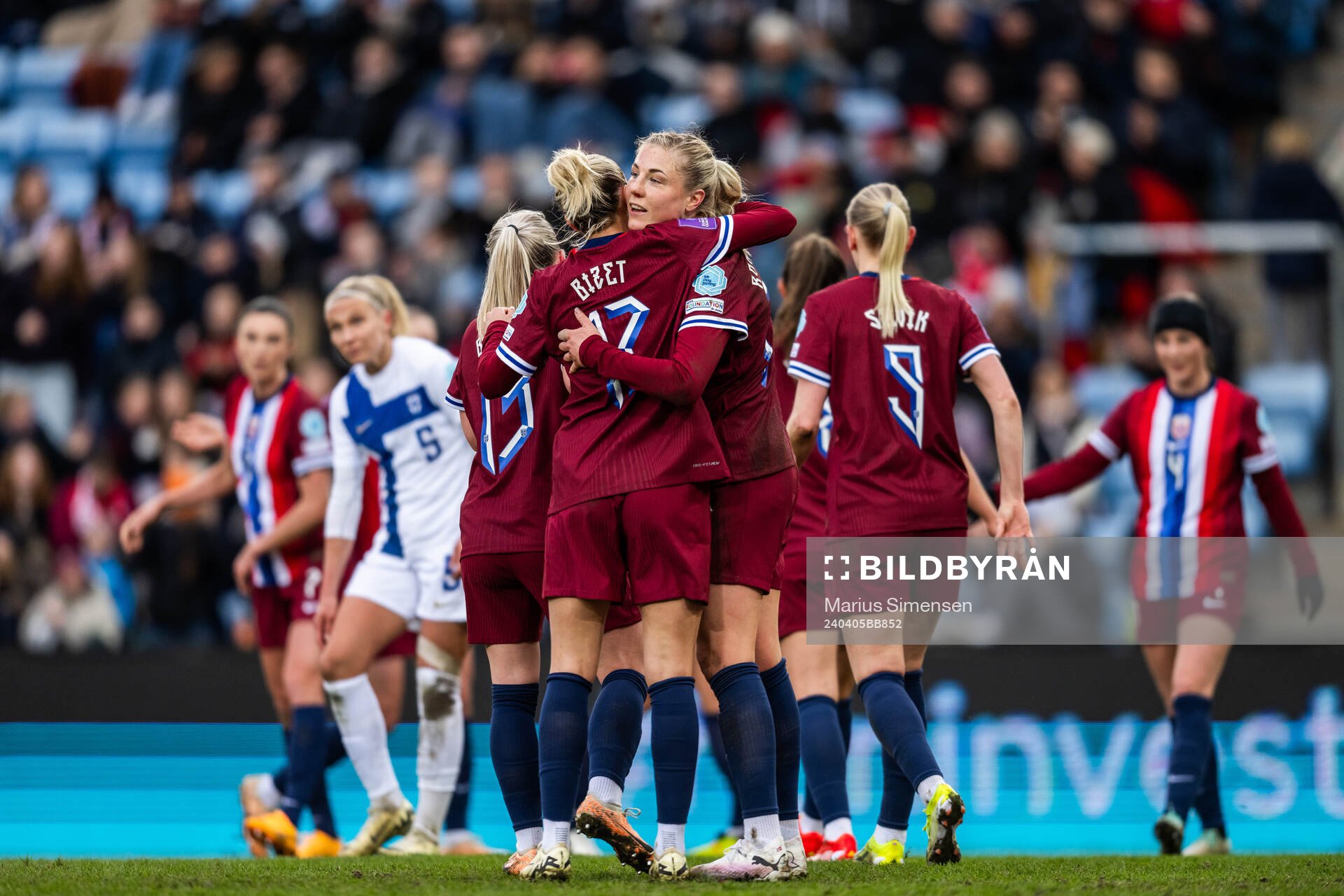 Sophie Roman Haug of Norway celebrates with team mates