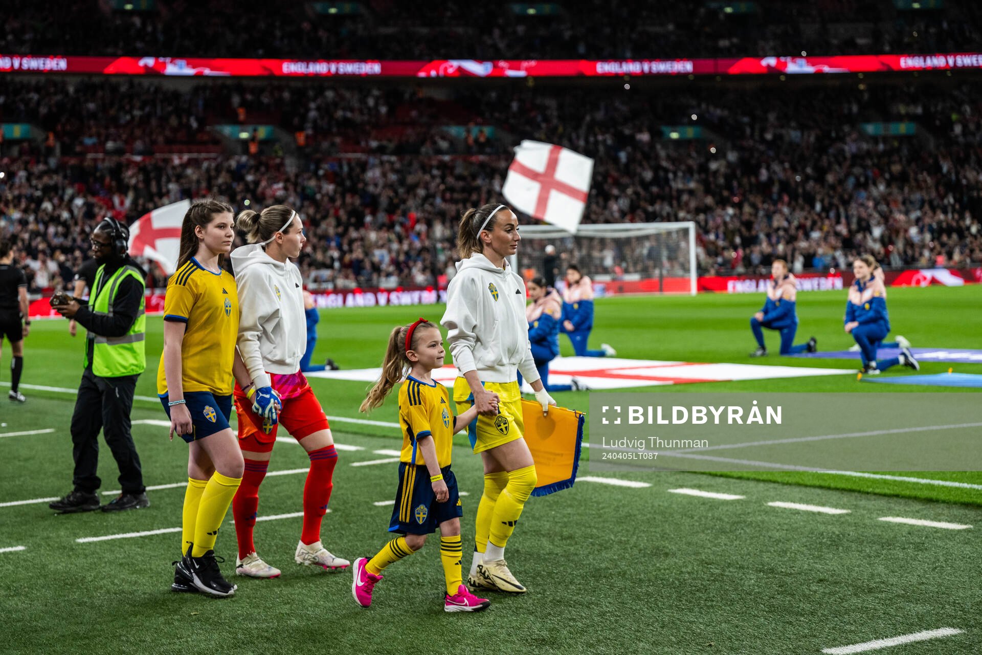 Goalkeeper Jennifer Falk and Kosovare Asllani of Sweden
