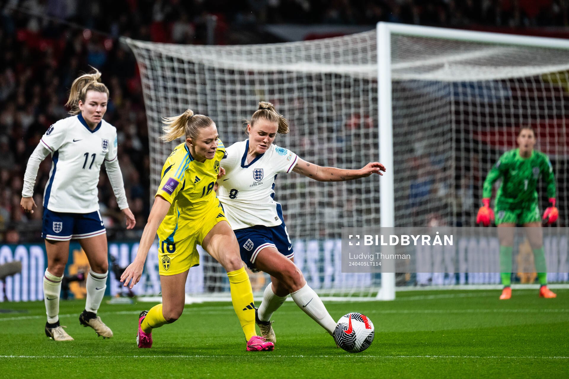 Lauren Hemp and Georgia Stanway of England compete for the
