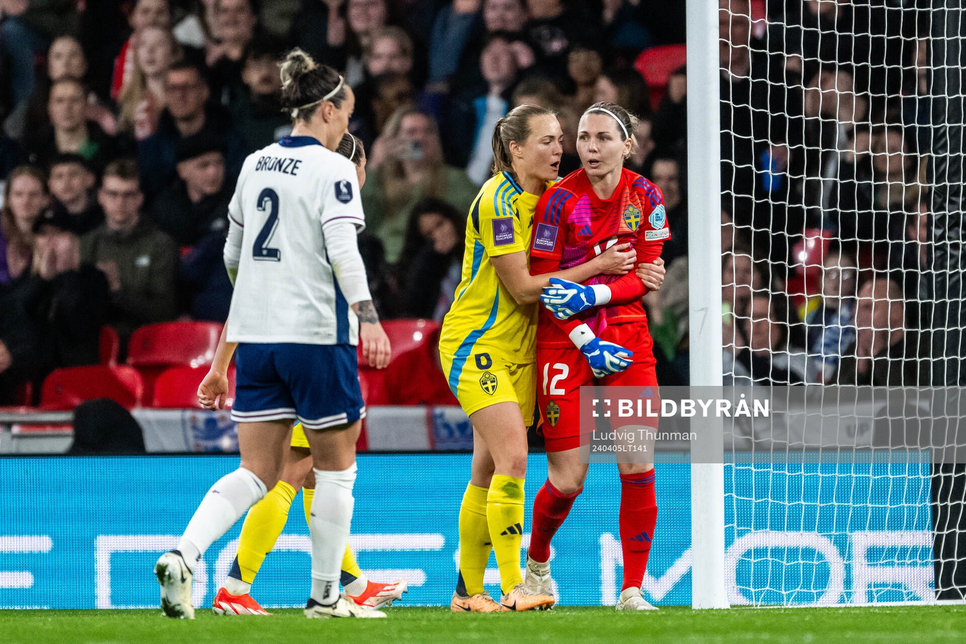Magdalena Eriksson celebrate with goalkeeper Jennifer Falk