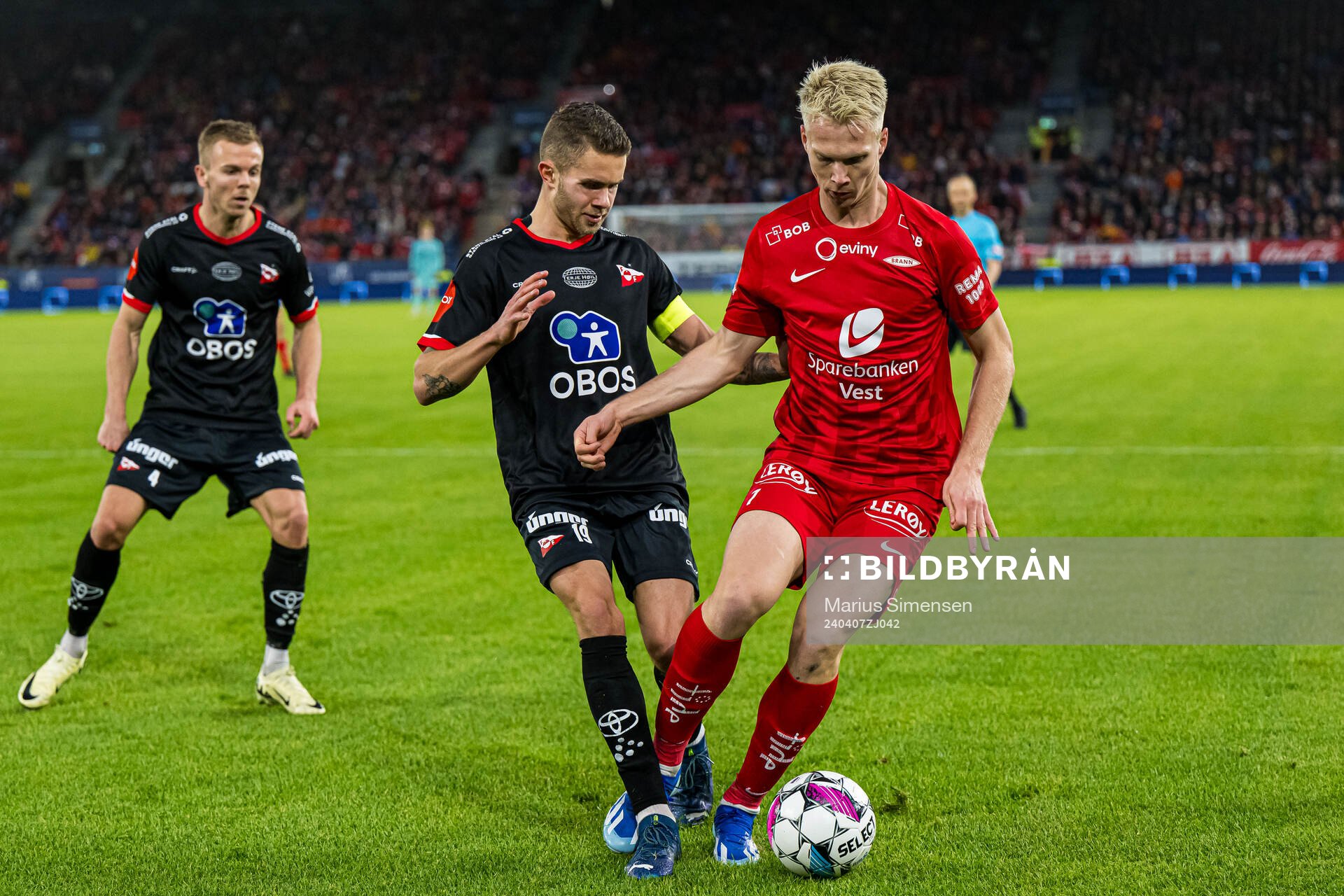 Julius Magnusson of Fredrikstad and Magnus Warming of Brann