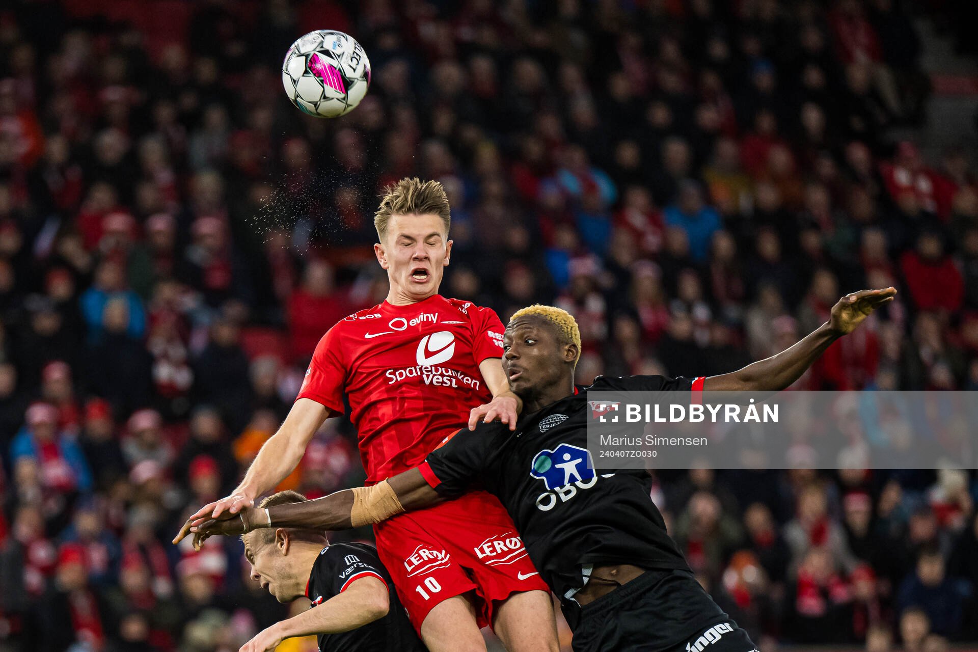 Emil Kornvig of Brann and Maxwell Woledzi of Fredrikstad
