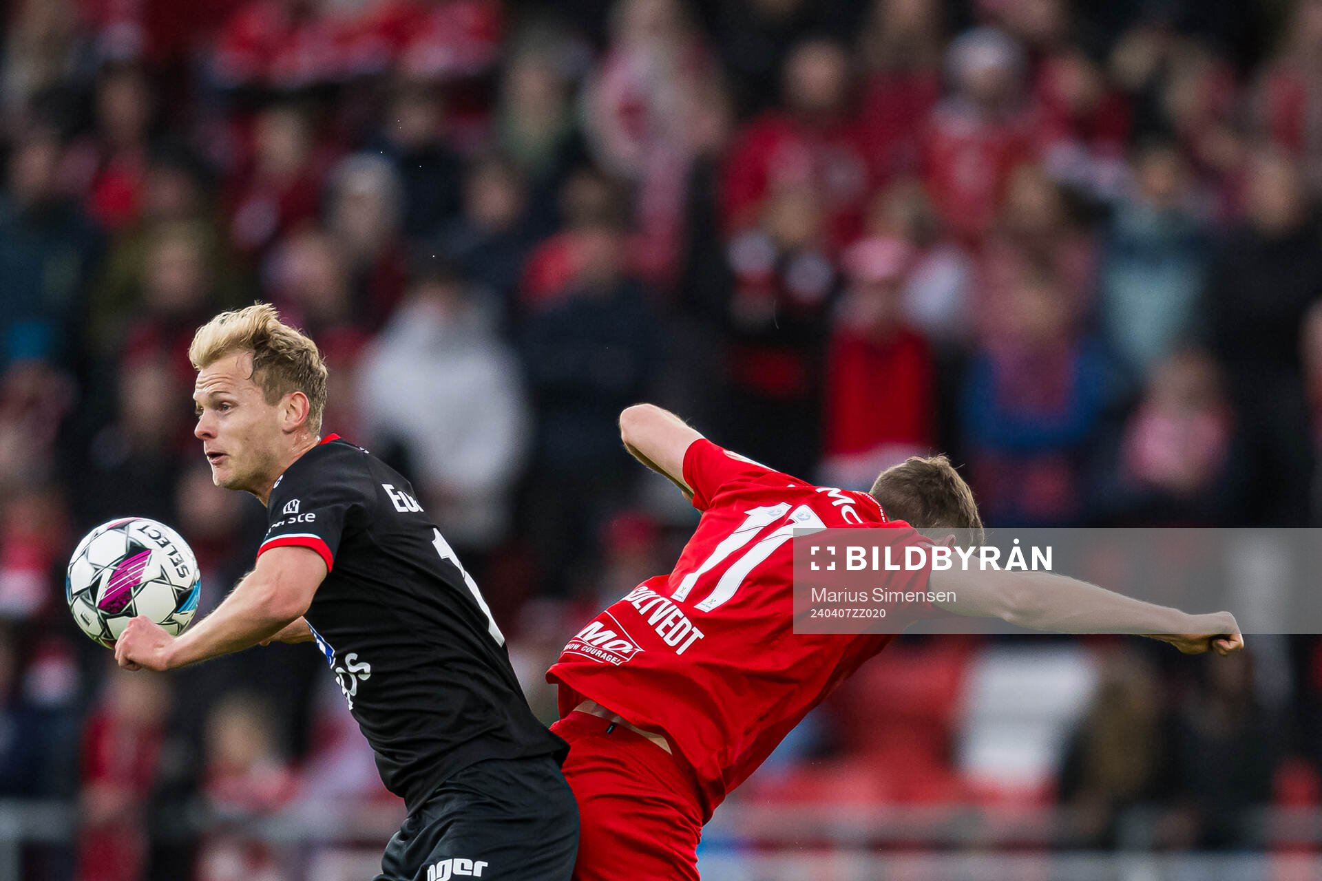 Morten Bjørlo of Fredrikstad and Joachim Soltvedt of Brann during the Eliteserien match between Brann and Fredrikstad on April 7, 2024 in Bergen.