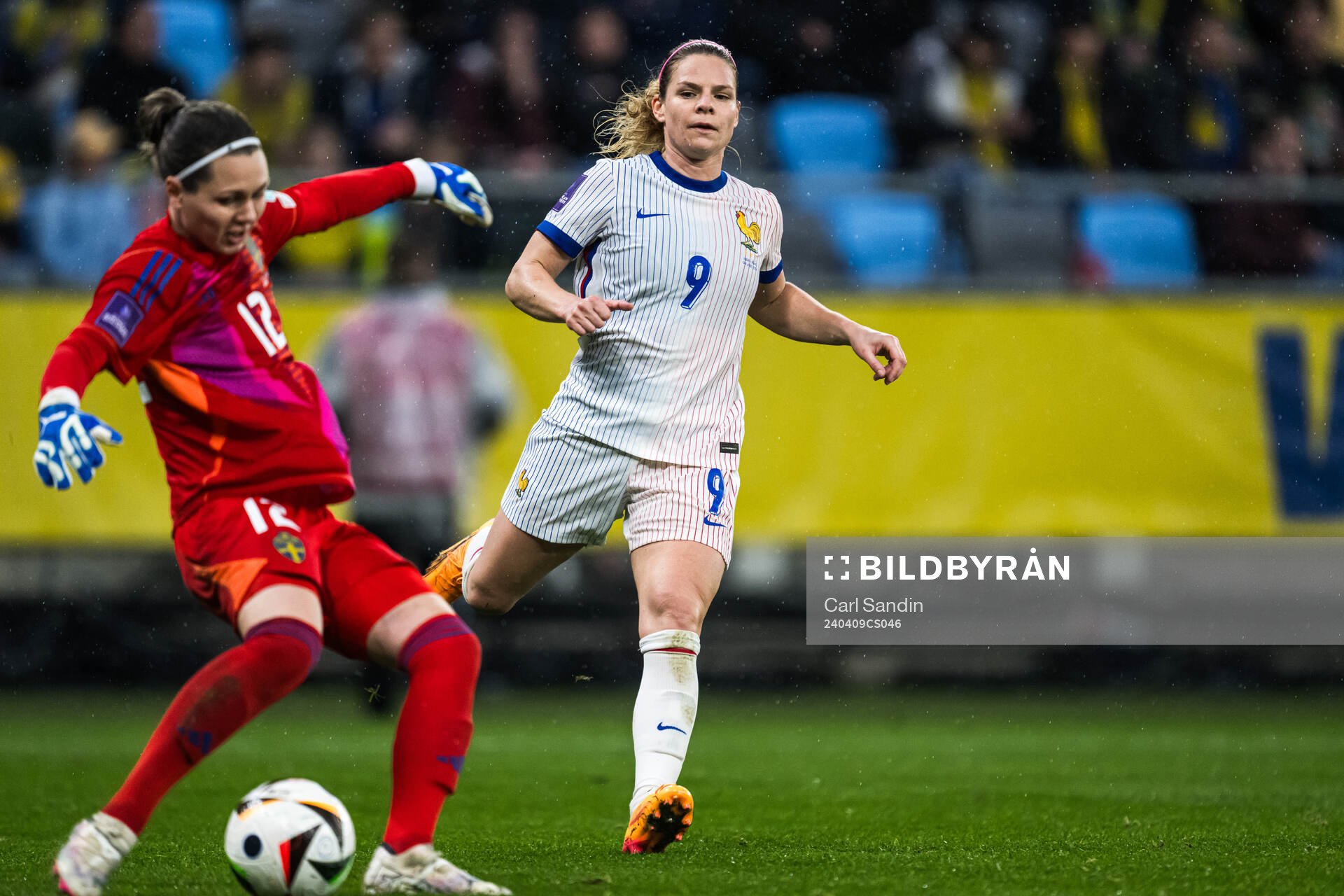 goalkeeper Jennifer Falk of Sweden and Eugénie Le Sommer