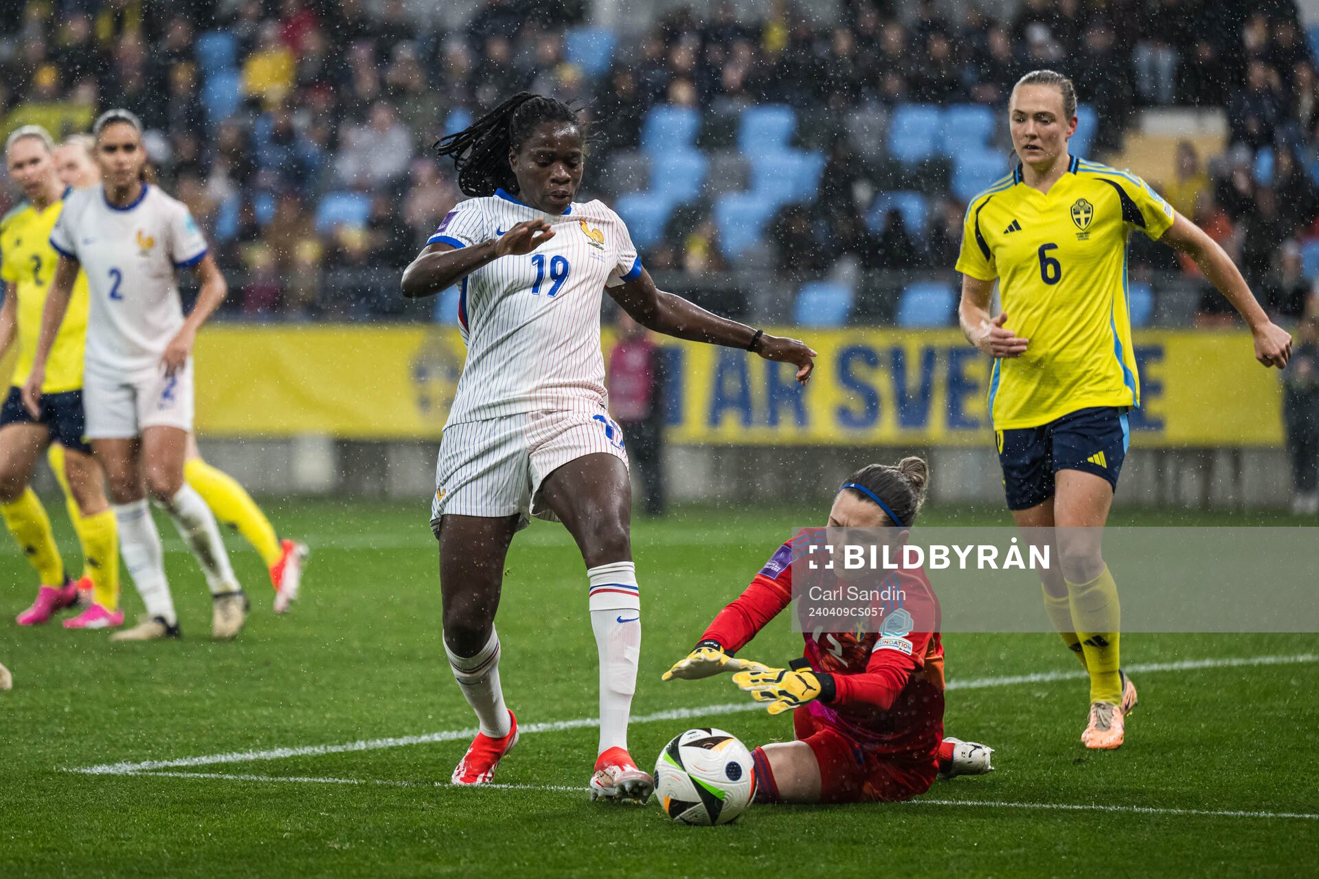 Griedge Mbock Bathy of France and goalkeeper Jennifer Falk of Sweden during the UEFA Women's Euro Qualifier football match between Sweden and France on April 9, 2024 in Gothenburg.