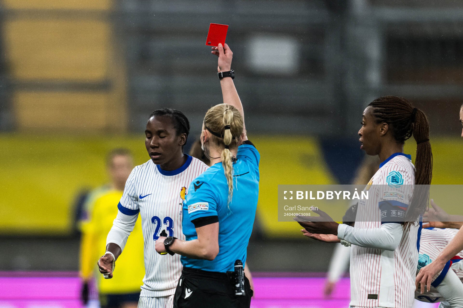 Vicki Becho of France receives a red card