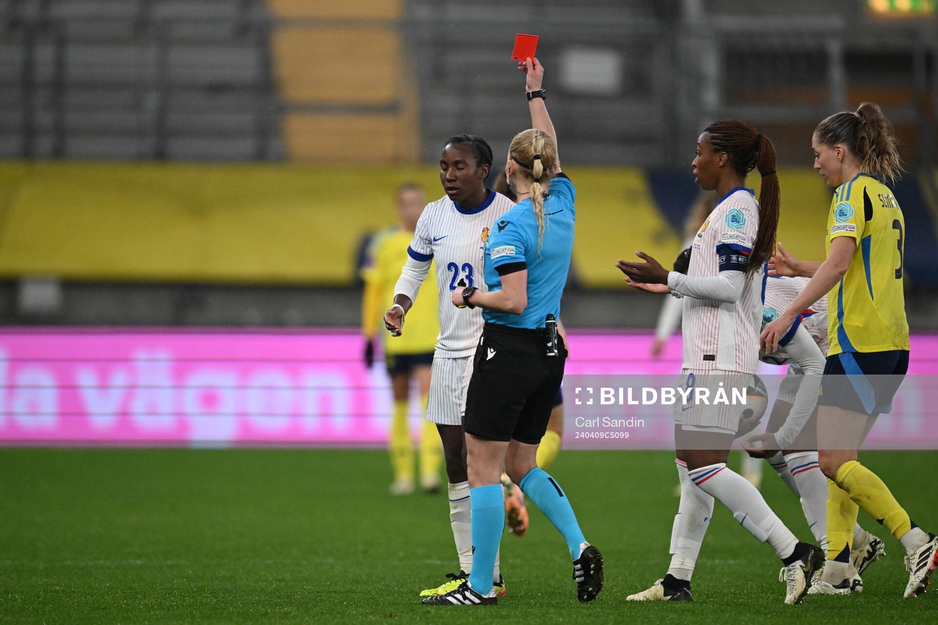 Vicki Becho of France receives a red card