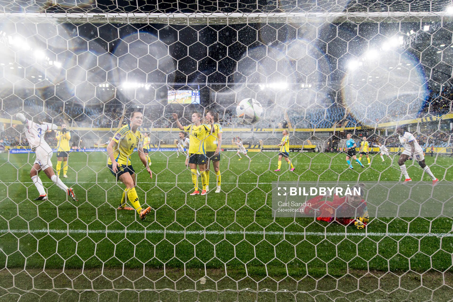 Magdalena Eriksson and goalkeeper Jennifer Falk of Sweden