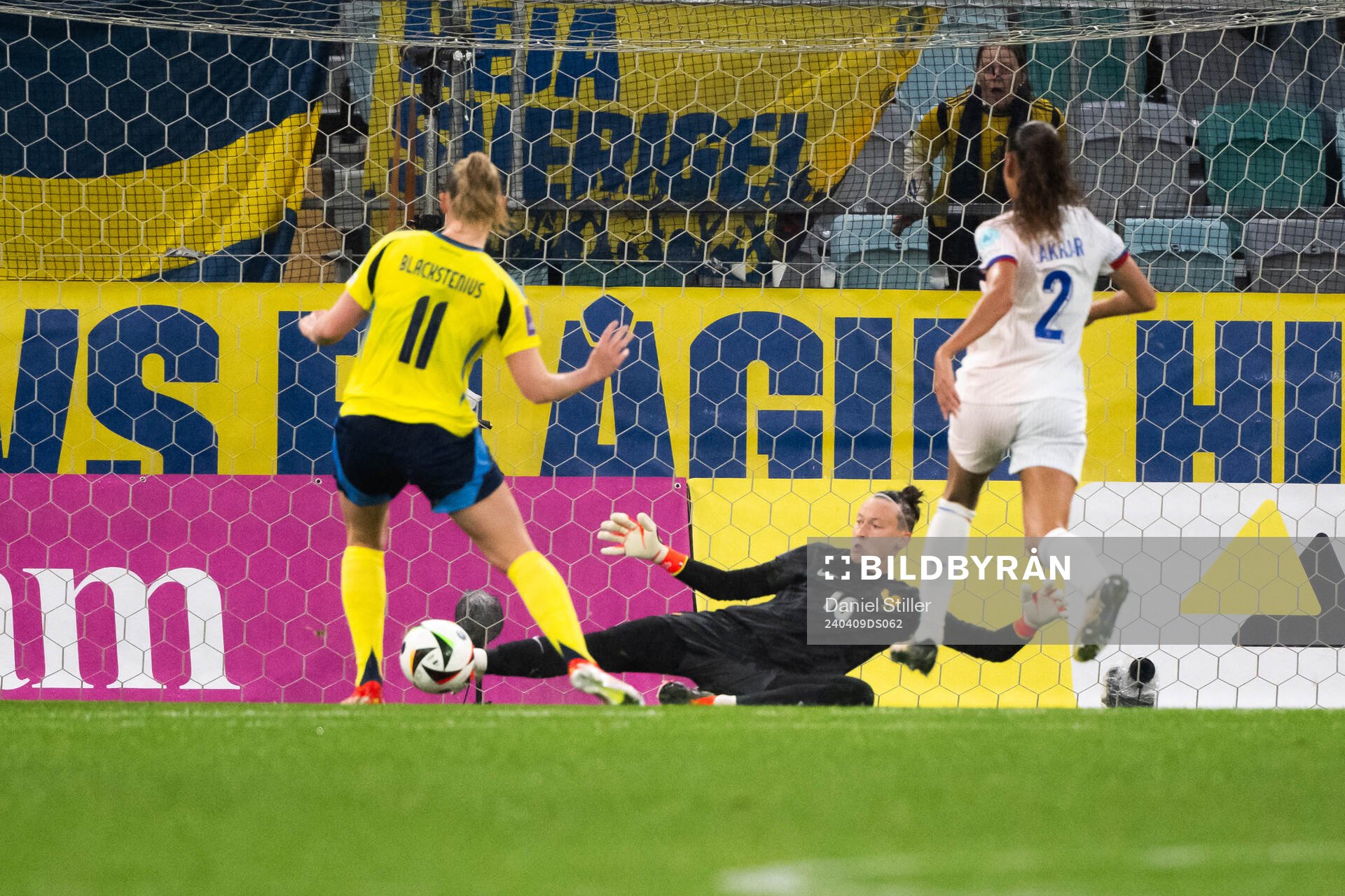 Stina Blackstenius of Sweden and goalkeeper Pauline