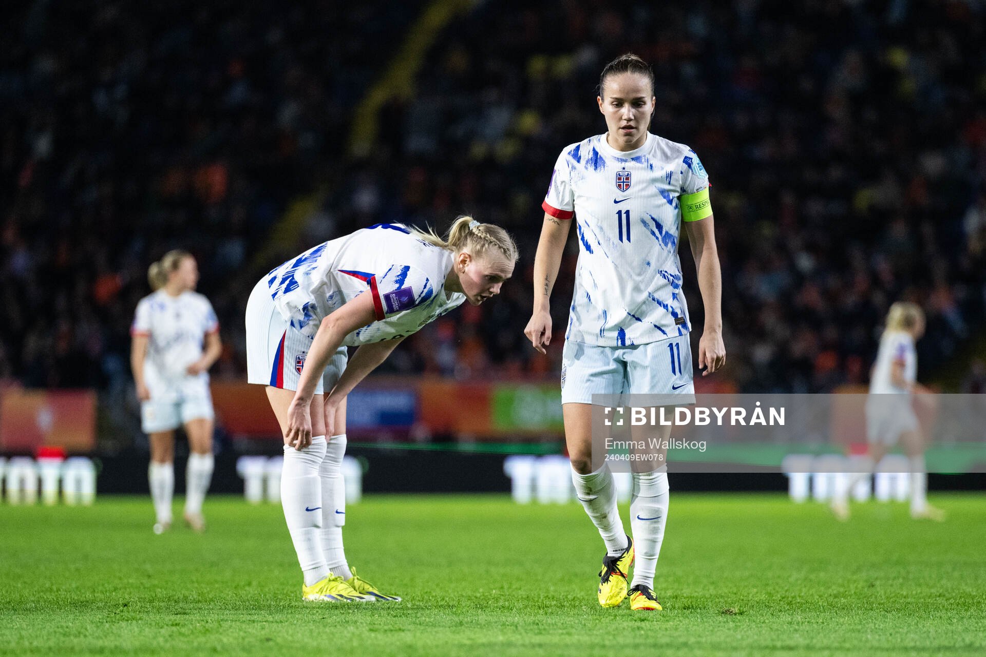 Karina Sævik  and Guro Reiten of Norway look dejected