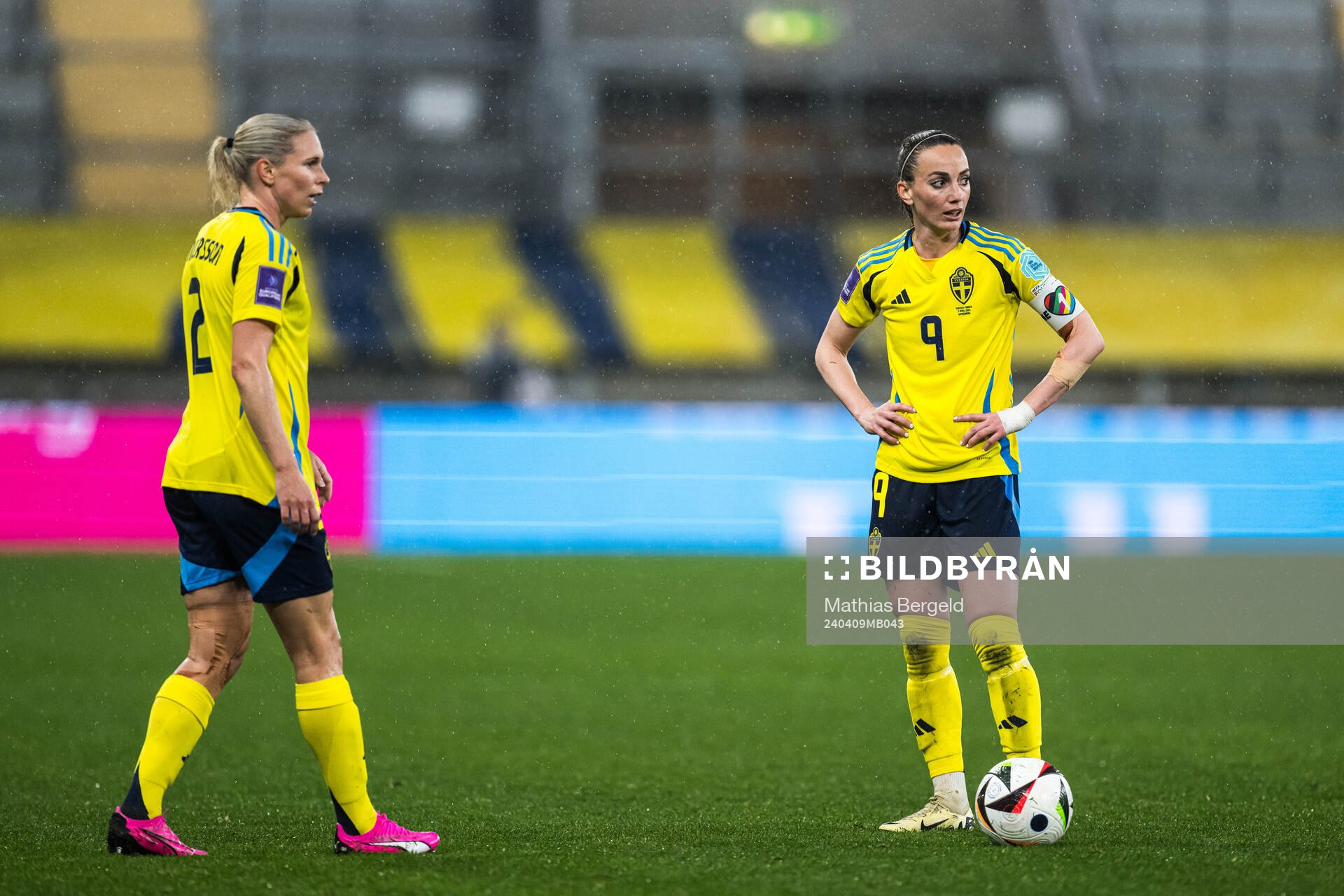 Jonna Andersson and Kosovare Asllani of Sweden looks