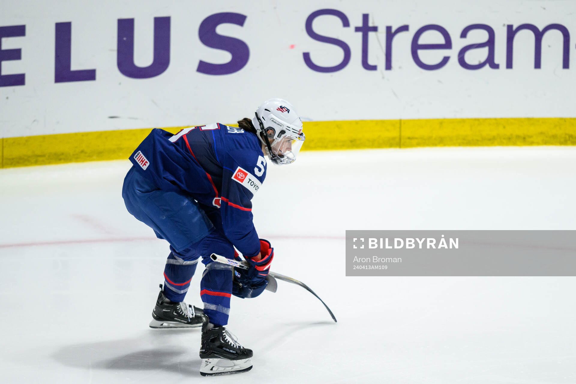 Megan Keller of USA picks upp objects