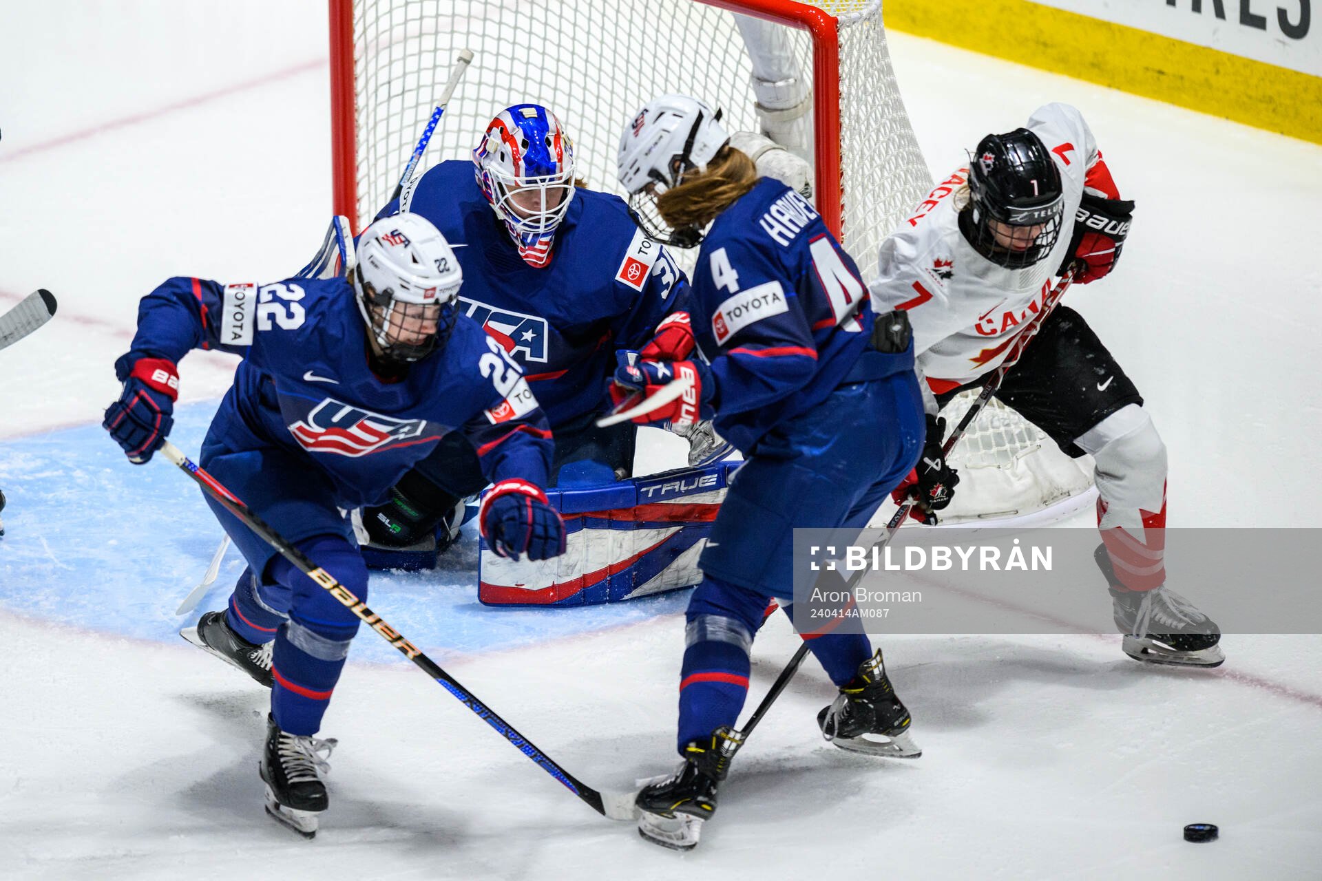 Tessa Janecke, goaltender Aerin Frankel and Caroline Harvey