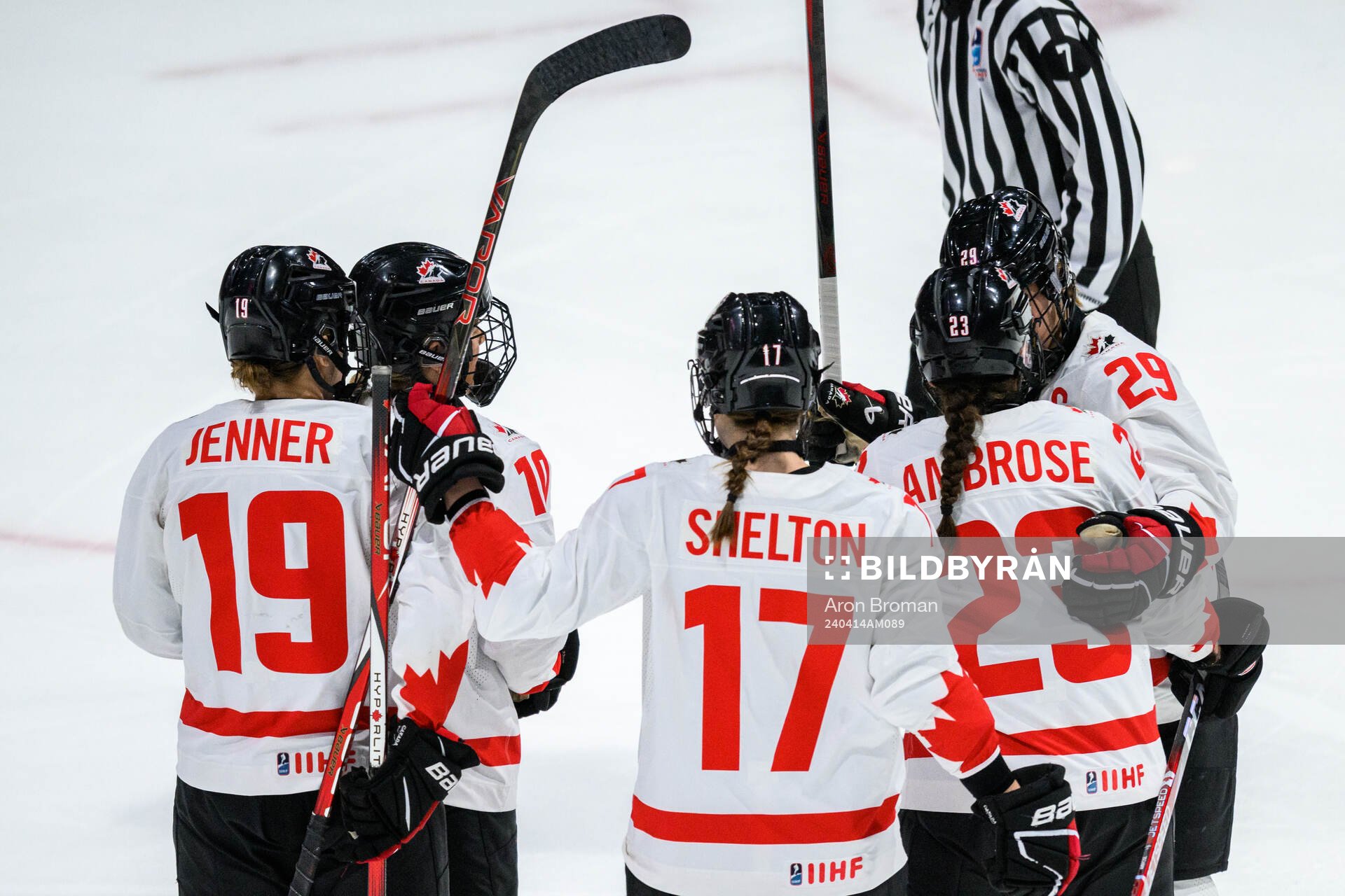 Erin Ambrose of Canada celebrates with teammates