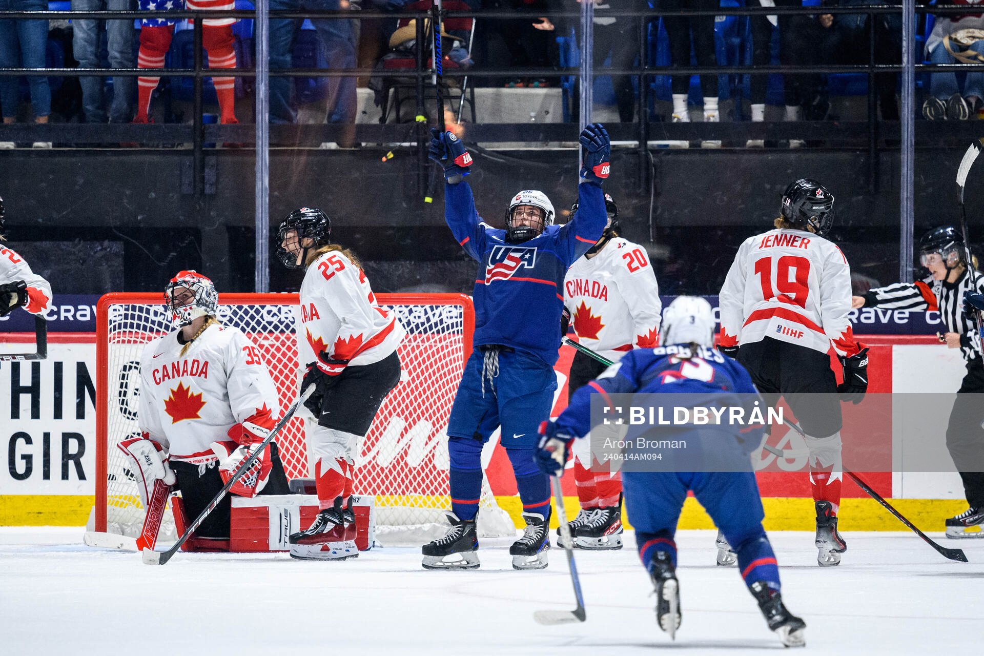 Alex Carpenter of USA celebrates scoring 3-2