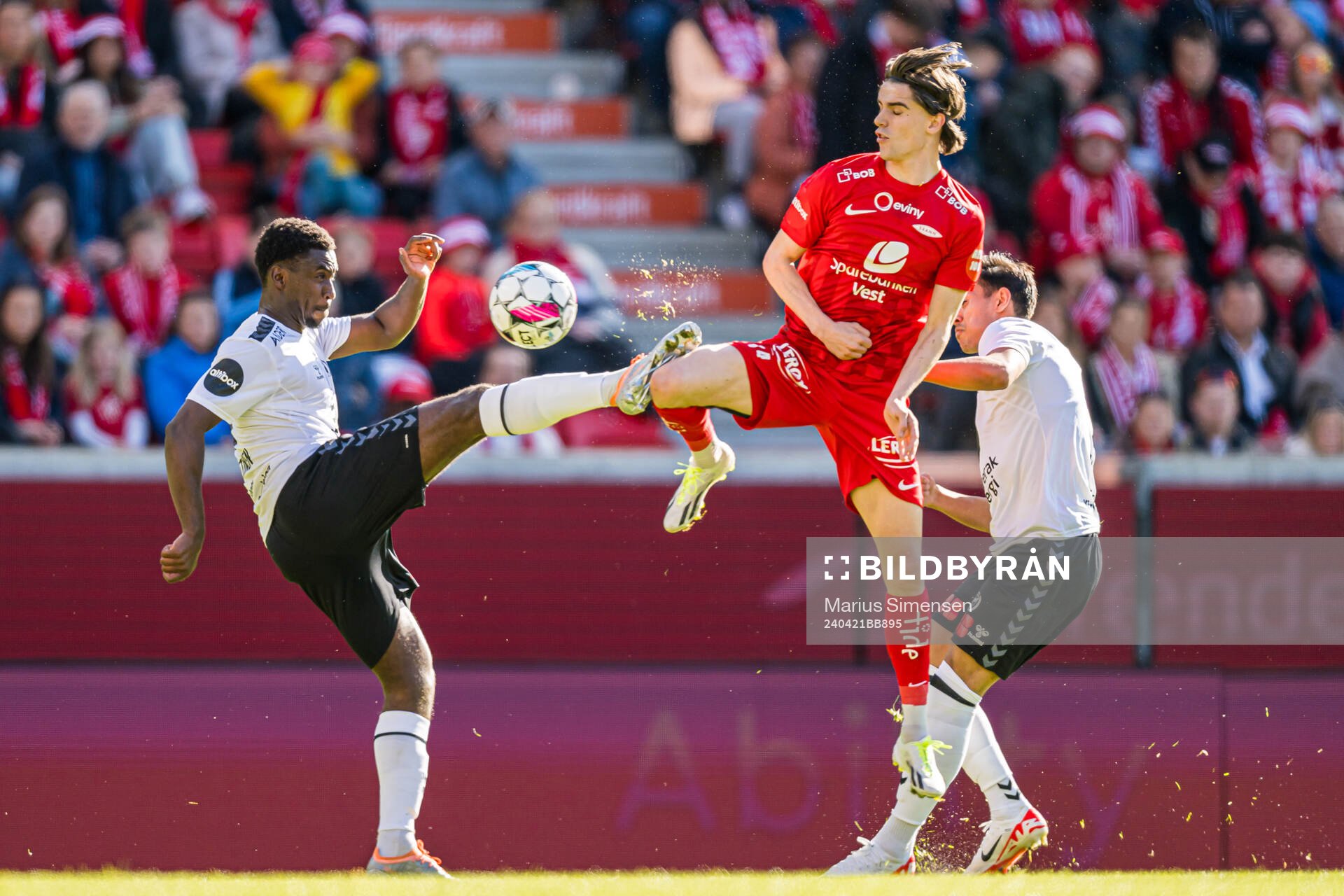 Tony Miettinen of Odd and Ulrik Mathisen of Brann