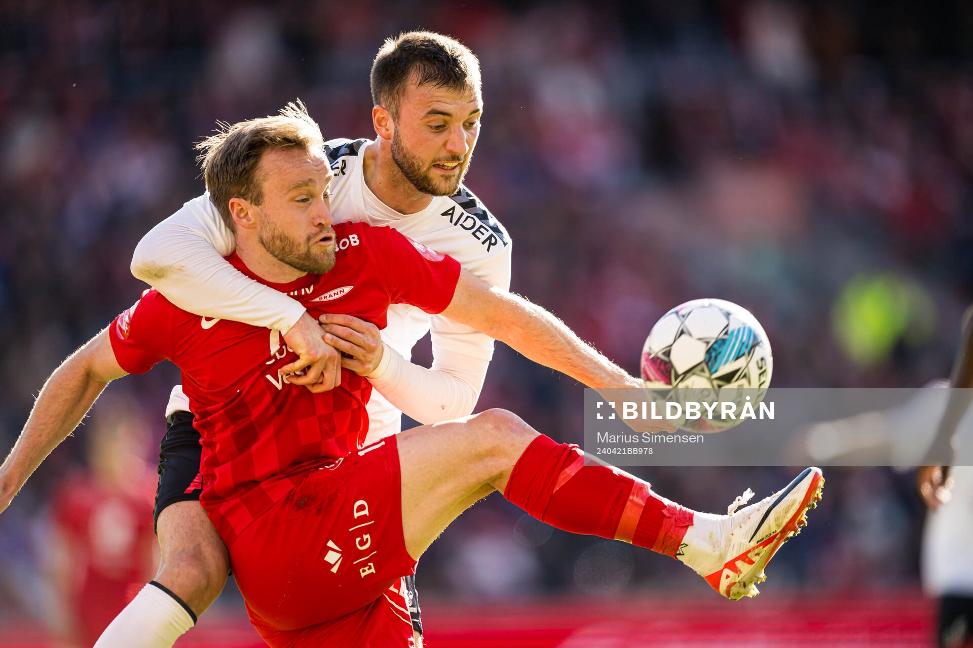 Bård Finne of Brann and Mihajlo Ivancevic of Odd during the Eliteserien match between Brann and Odd on April 21, 2024 in Bergen. 