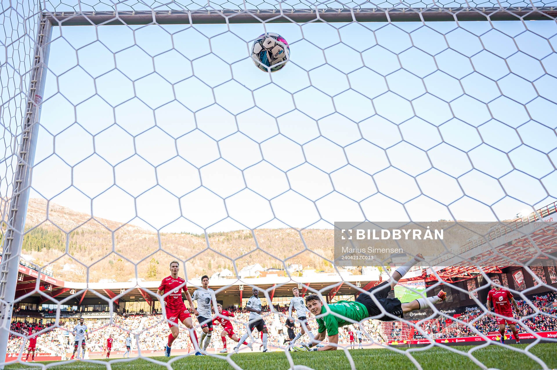 Aune Heggebø of Brann scores the 2-0 goal behind Casper