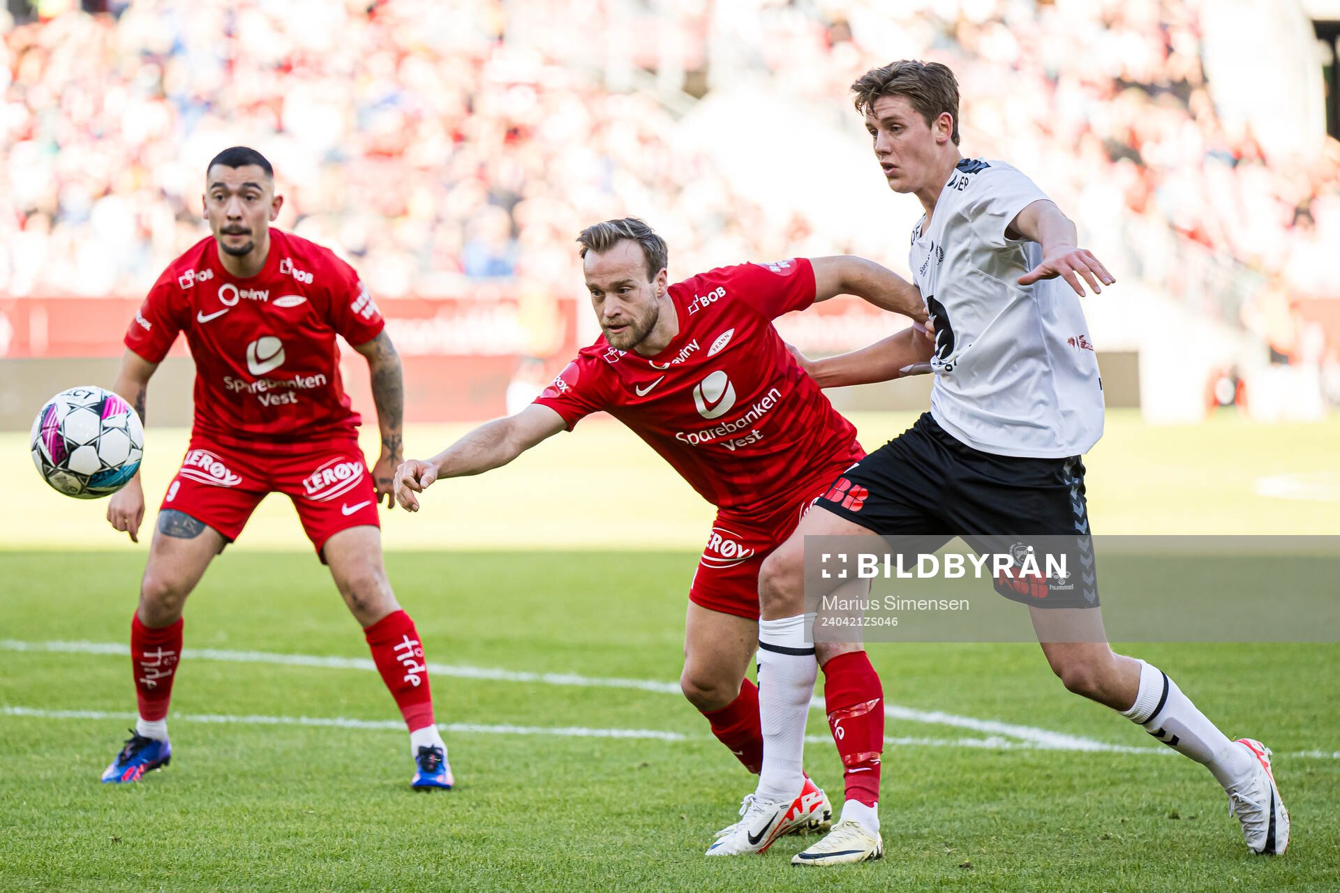 Bård Finne of Brann and Filip Rønningen Jørgensen of Odd during the Eliteserien match between Brann and Odd on April 21, 2024 in Bergen. 