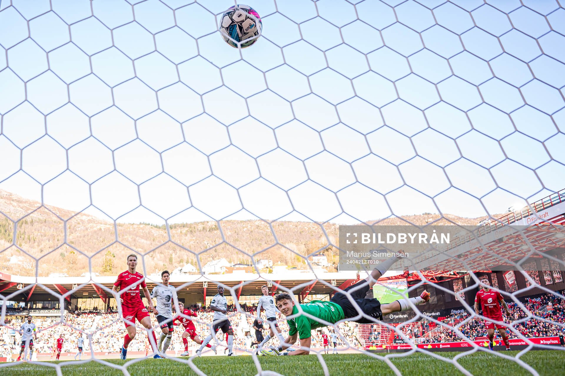Aune Heggebø of Brann scores the 2-0 goal behind Casper