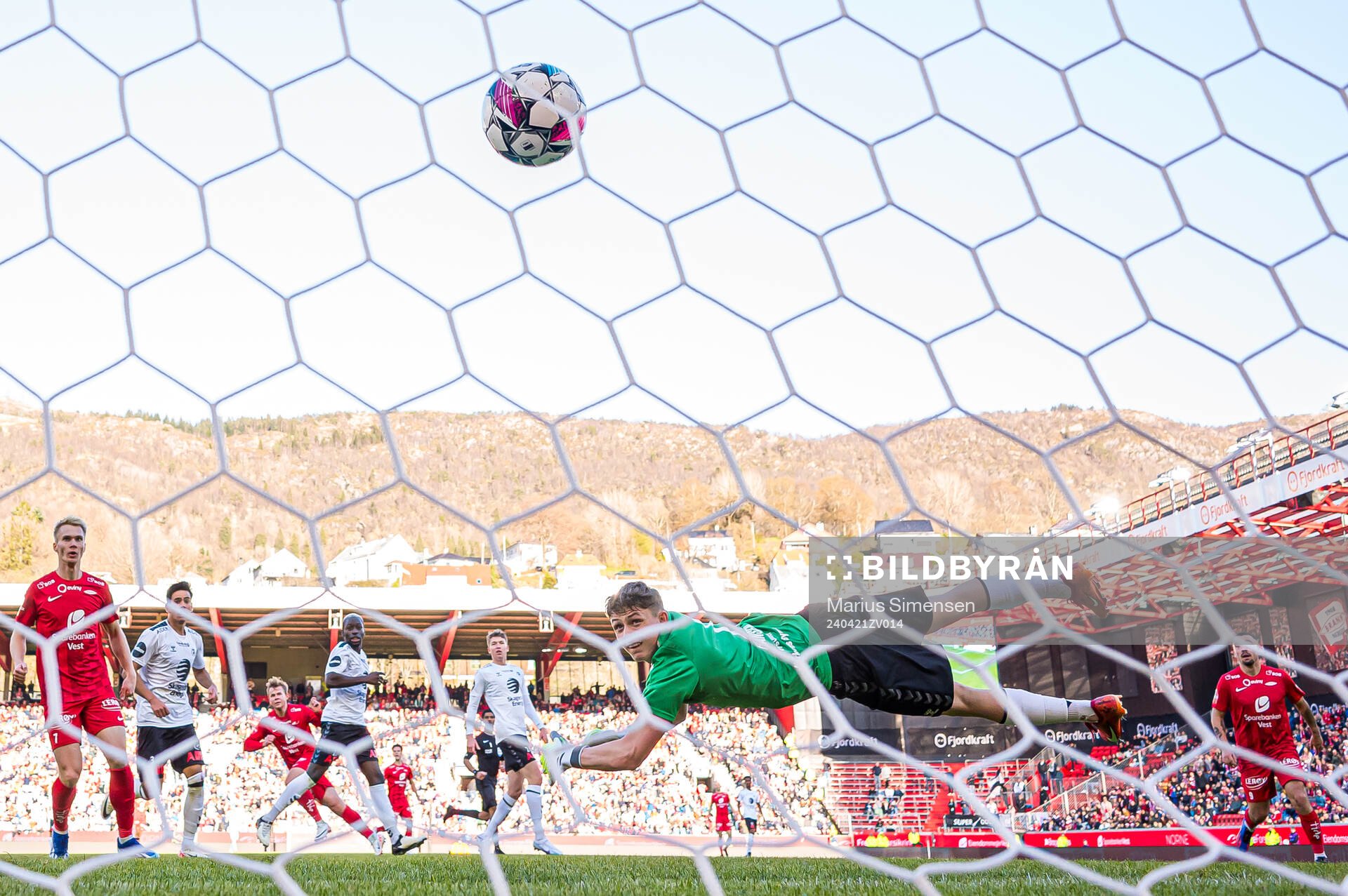 Aune Heggebø of Brann scores the 2-0 goal behind Casper