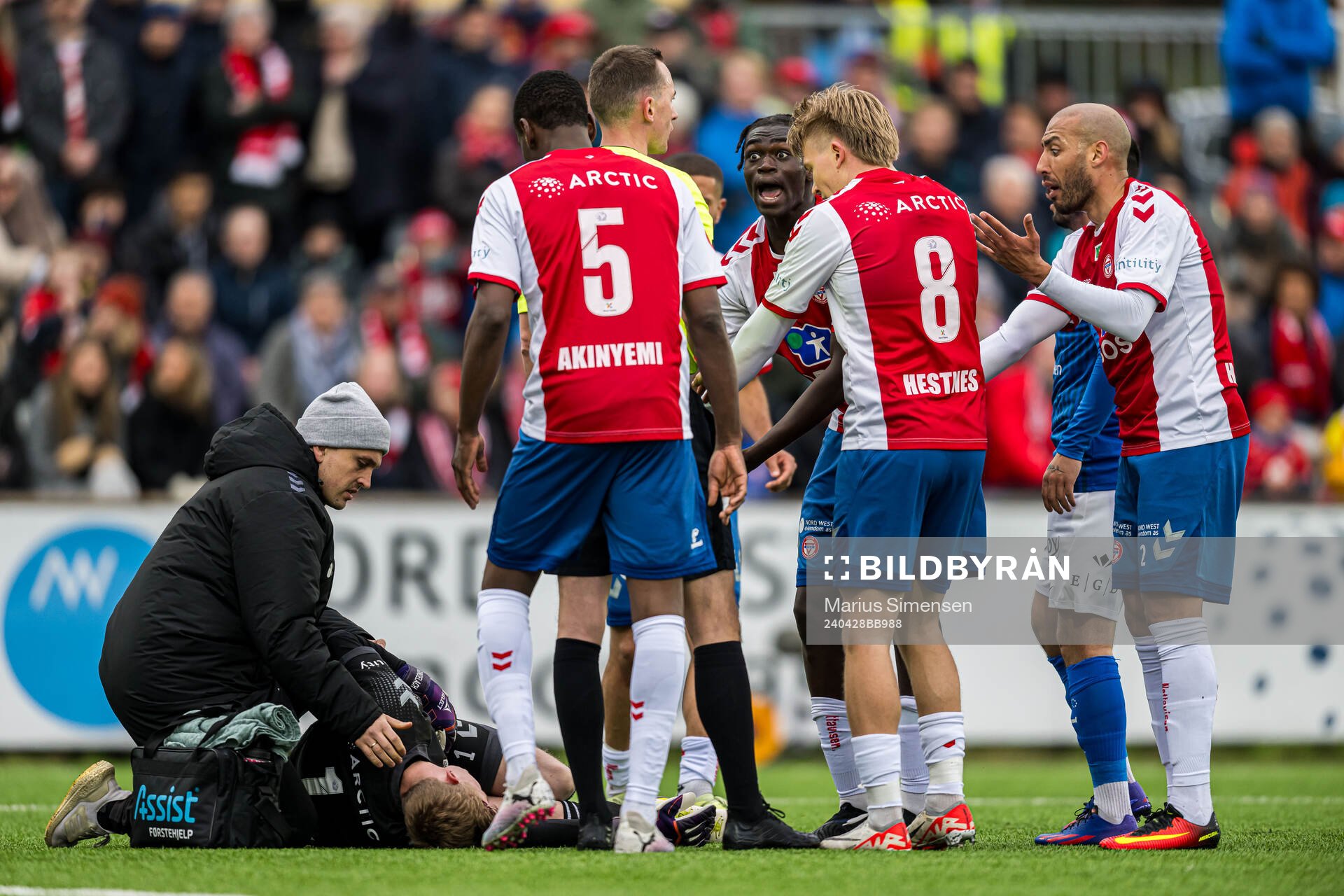 Emil Ødegaard of KFUM and Marius Hansen Grøtta, referee, during the Eliteserien match between KFUM and Brann on April 28, 2024 in Oslo. 