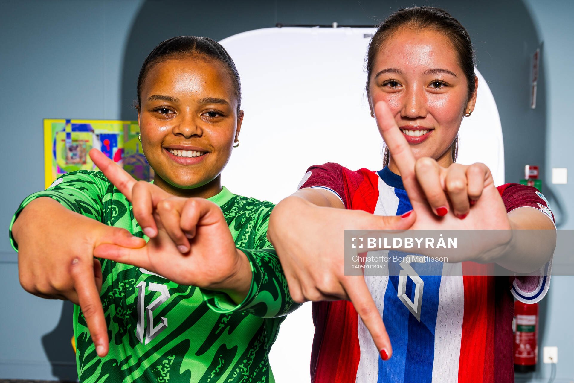 Goalkeeper Maria Kroken and Henny Thorallsson of the