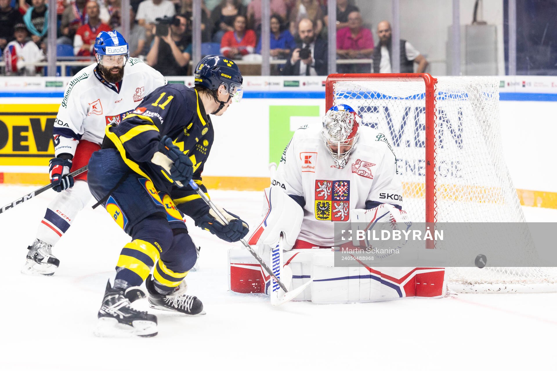 Joakim Nygård of Sweden against Radko Gudas and goaltender