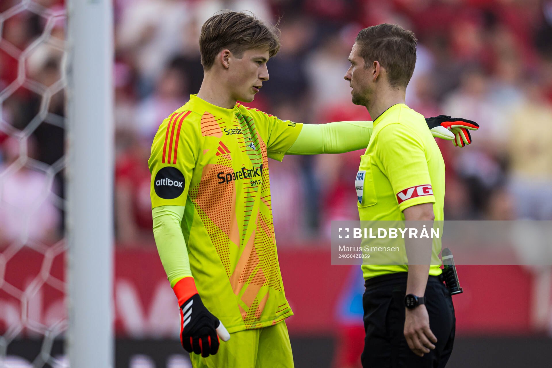 Sander Tangvik of Rosenborg and Espen Andreas Eskås, referee, during the Eliteserien match between Brann and Rosenborg on May 4, 2024 in Bergen.